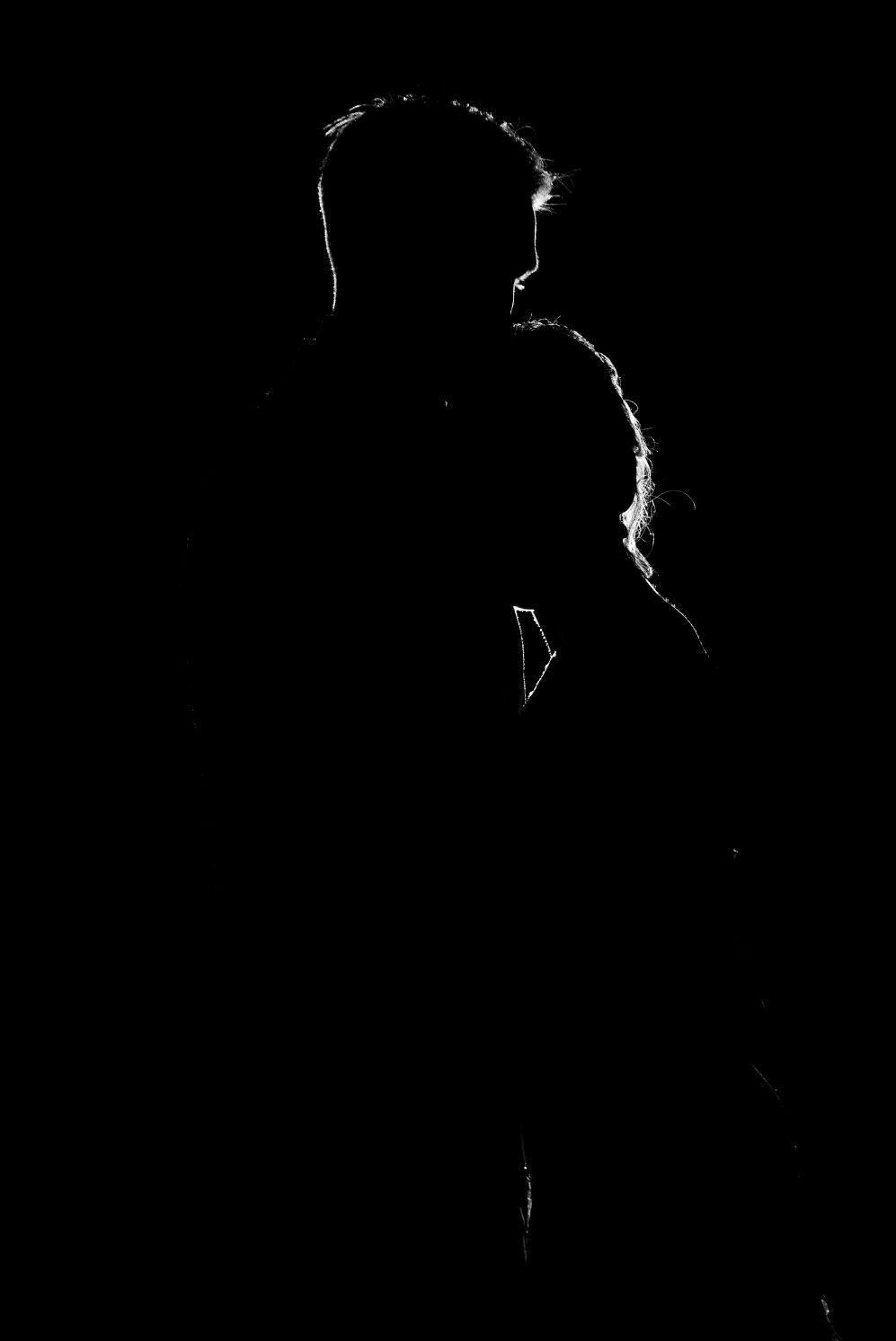 Mighty feelings. Man and woman silhouette, Black background photography, Black and white couples