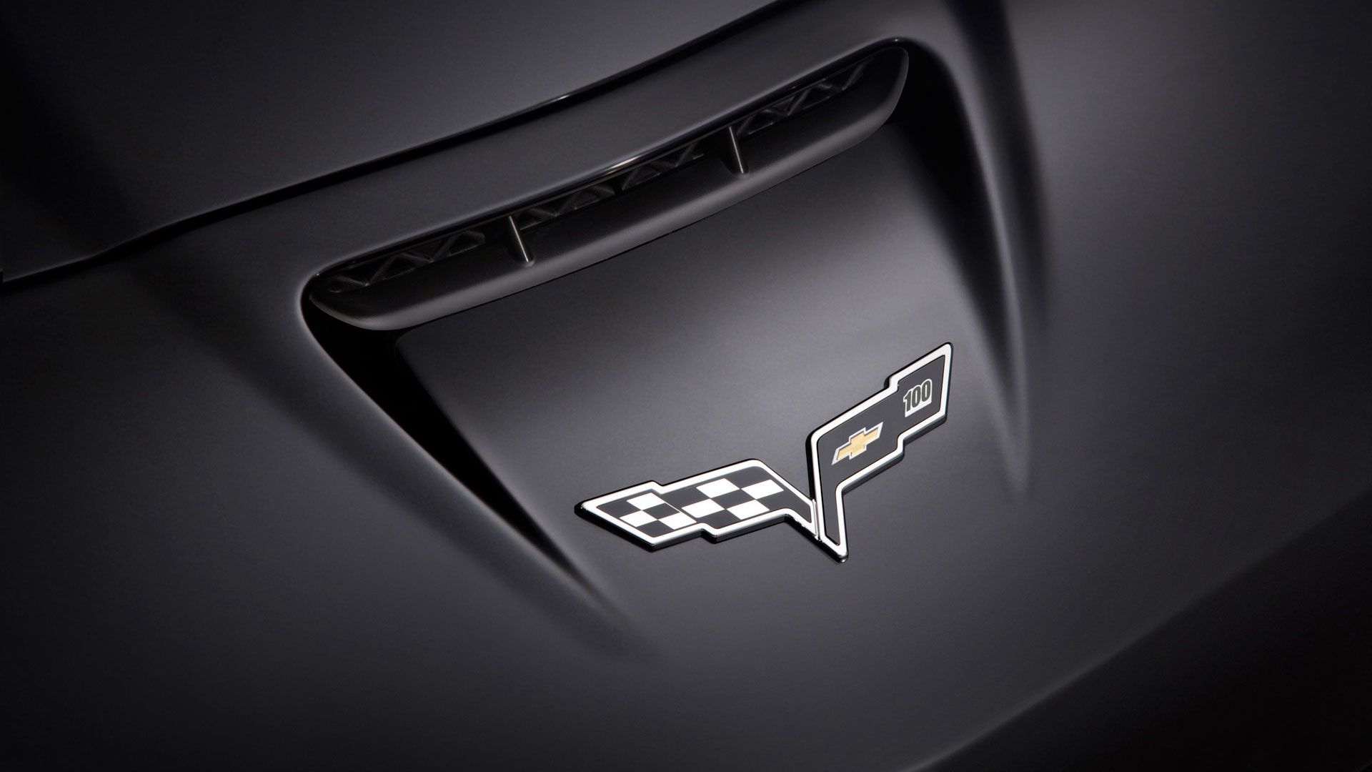 Shiny symbol of Chevrolet Corvette  HD wallpaper