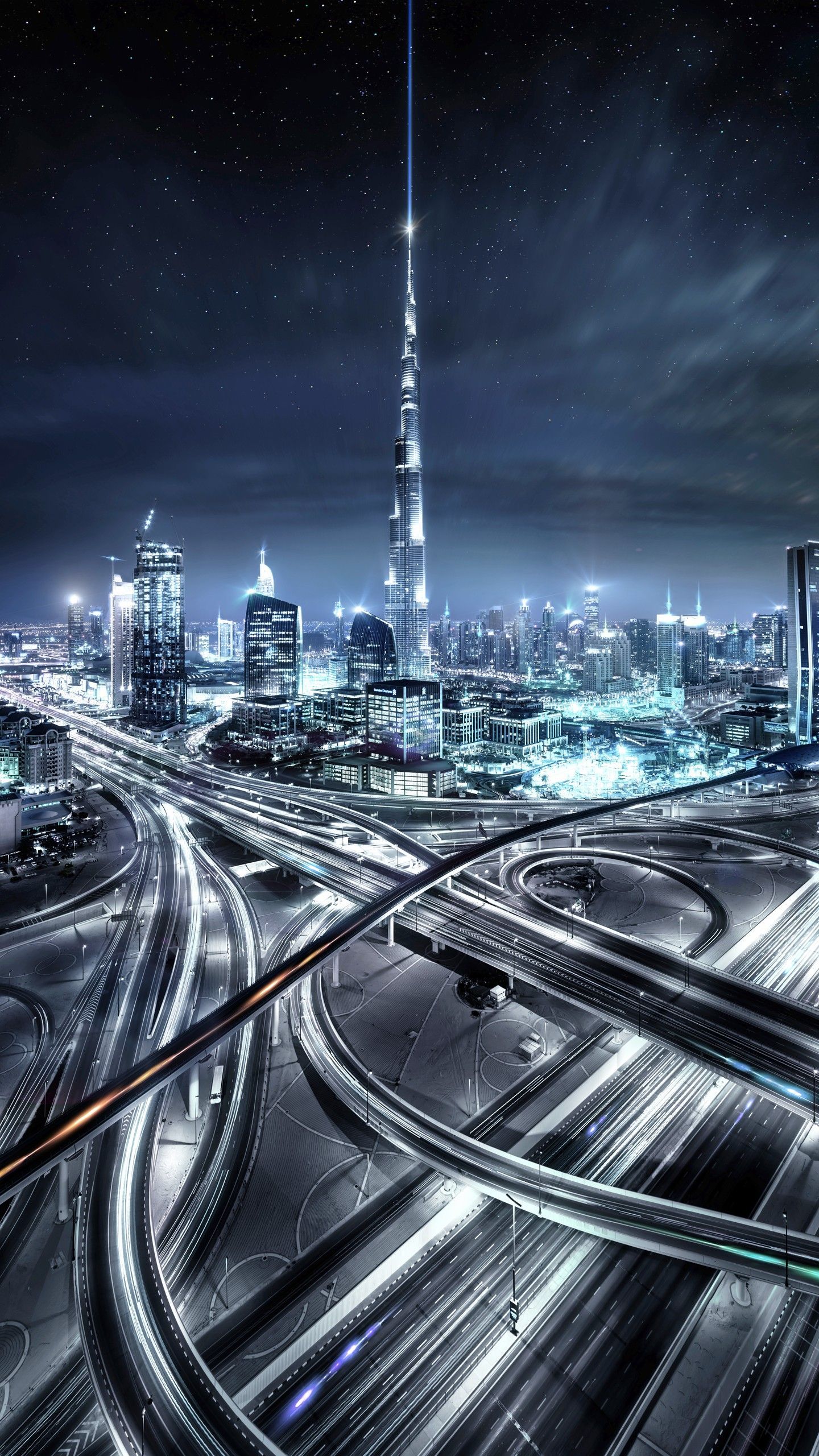 portrait display, #aerial view, #long exposure, #Dubai, #United Arab Emirates, #night, #stars, #clouds, #lights, #sk. Dubai city, Burj khalifa, City architecture