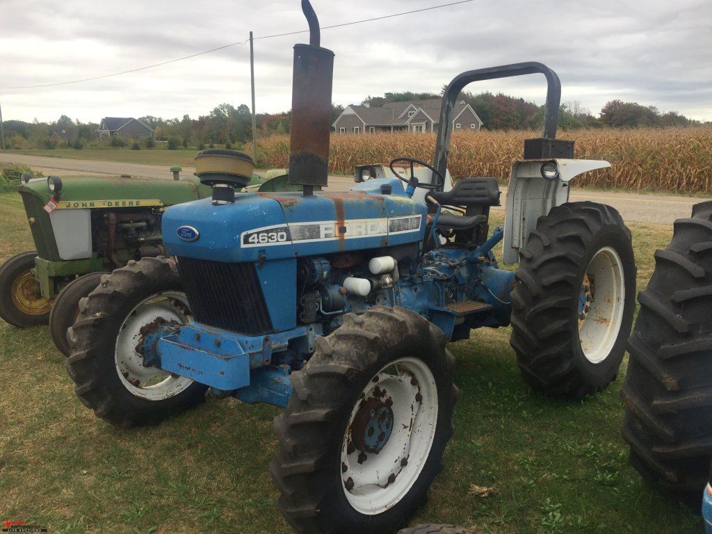 FORD 4630 TRACTOR, 3 PT PTO, NO TOP LINK, REMOTES, 4 WHEEL DRIVE, RUNS AND DRIVES. Farm Machinery & Implements Tractors