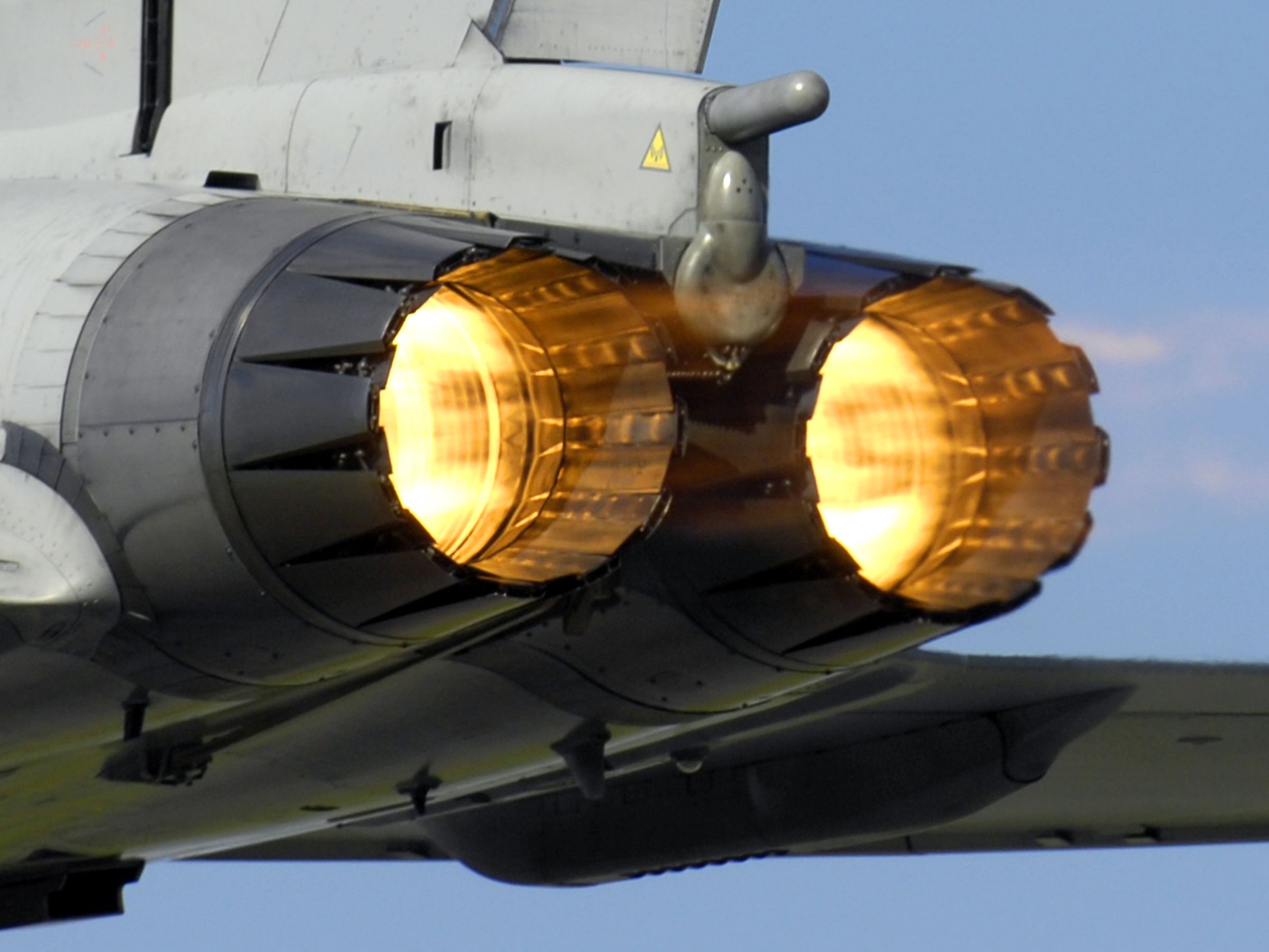 A Typhoon F2 fighter ignites its afterburners whilst taking off from RAF Coningsby MOD