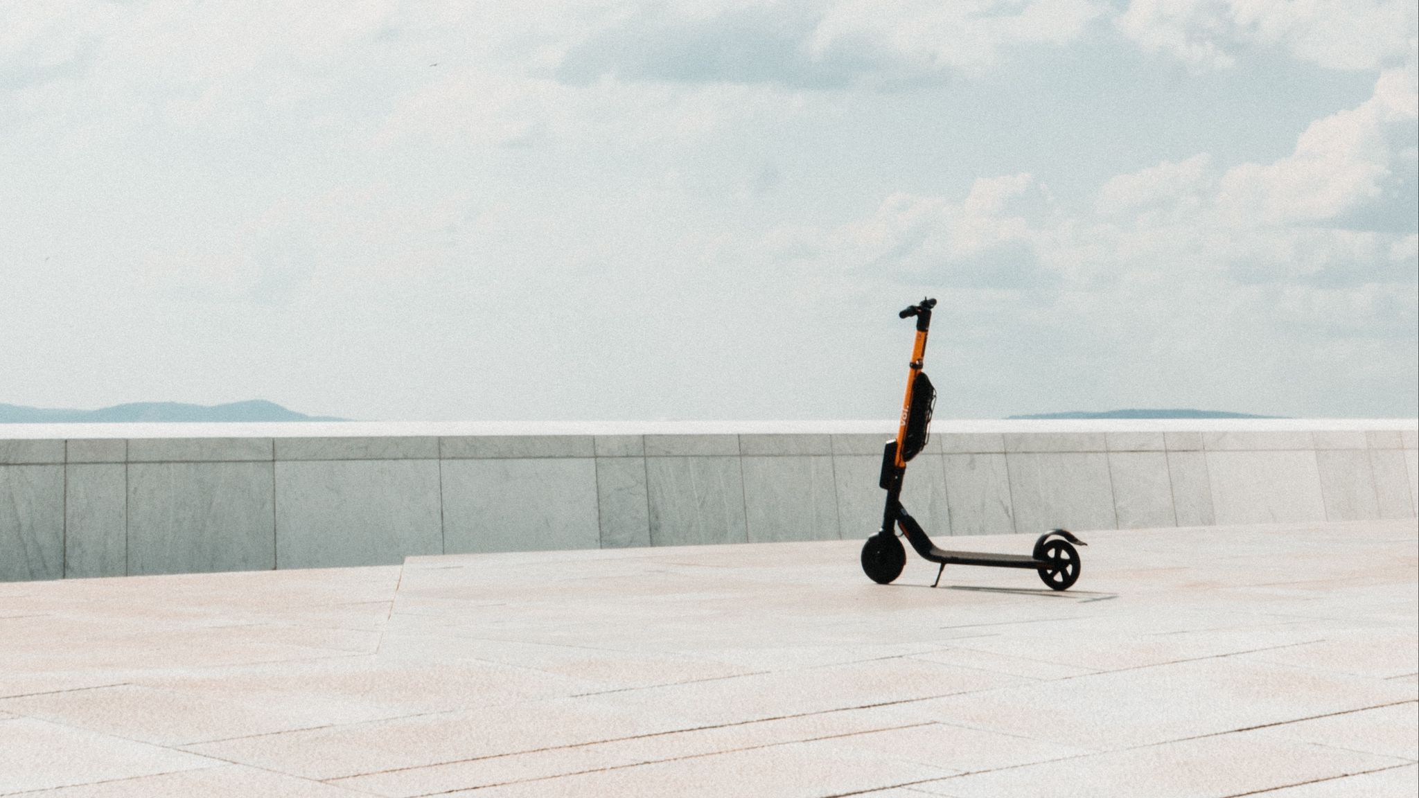 Download wallpaper 2048x1152 kick scooter, roof, minimalism, clouds ultrawide monitor HD background