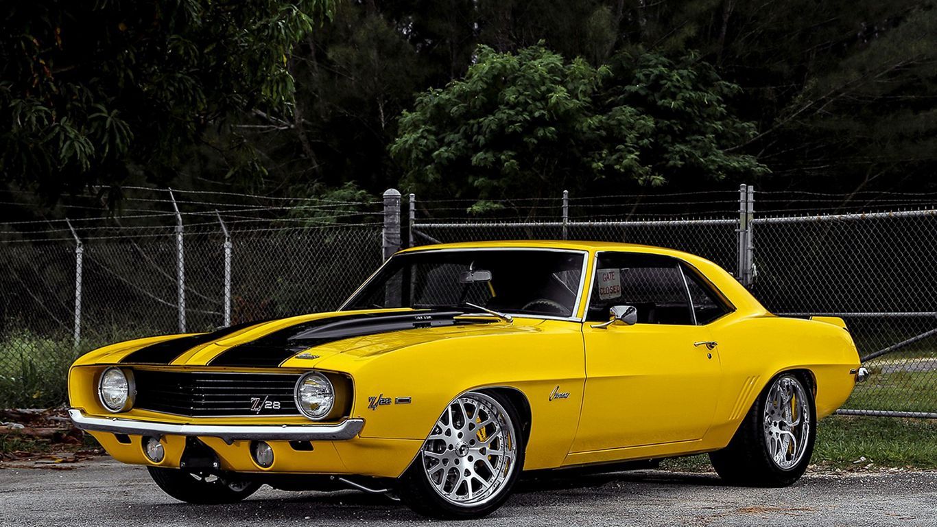 Download wallpaper 1366x768 chevrolet, camaro, 1969, yellow, side view tablet, laptop HD background