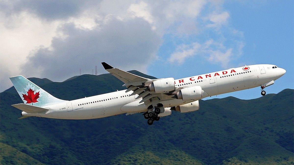 Background Wallpaper: Airbus A340 500 Air Canada Among Mountains