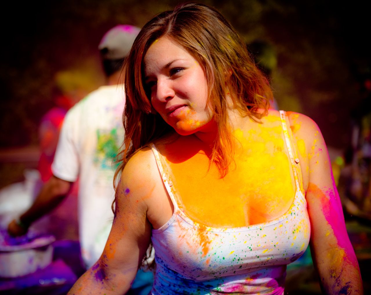 A cute girl celebrating holi festival
