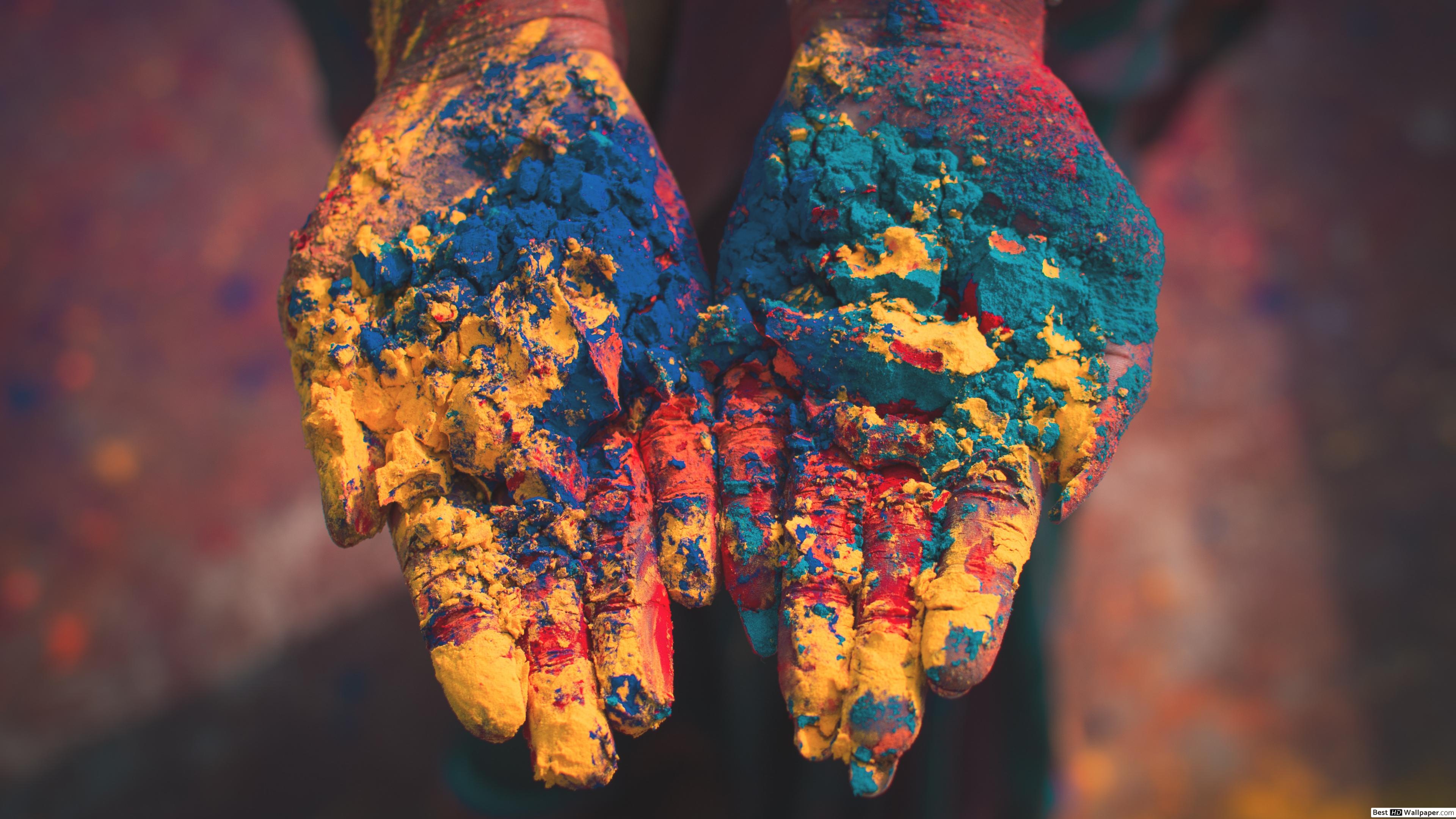 Hands full of colorful powder on Holi Festival HD wallpaper download