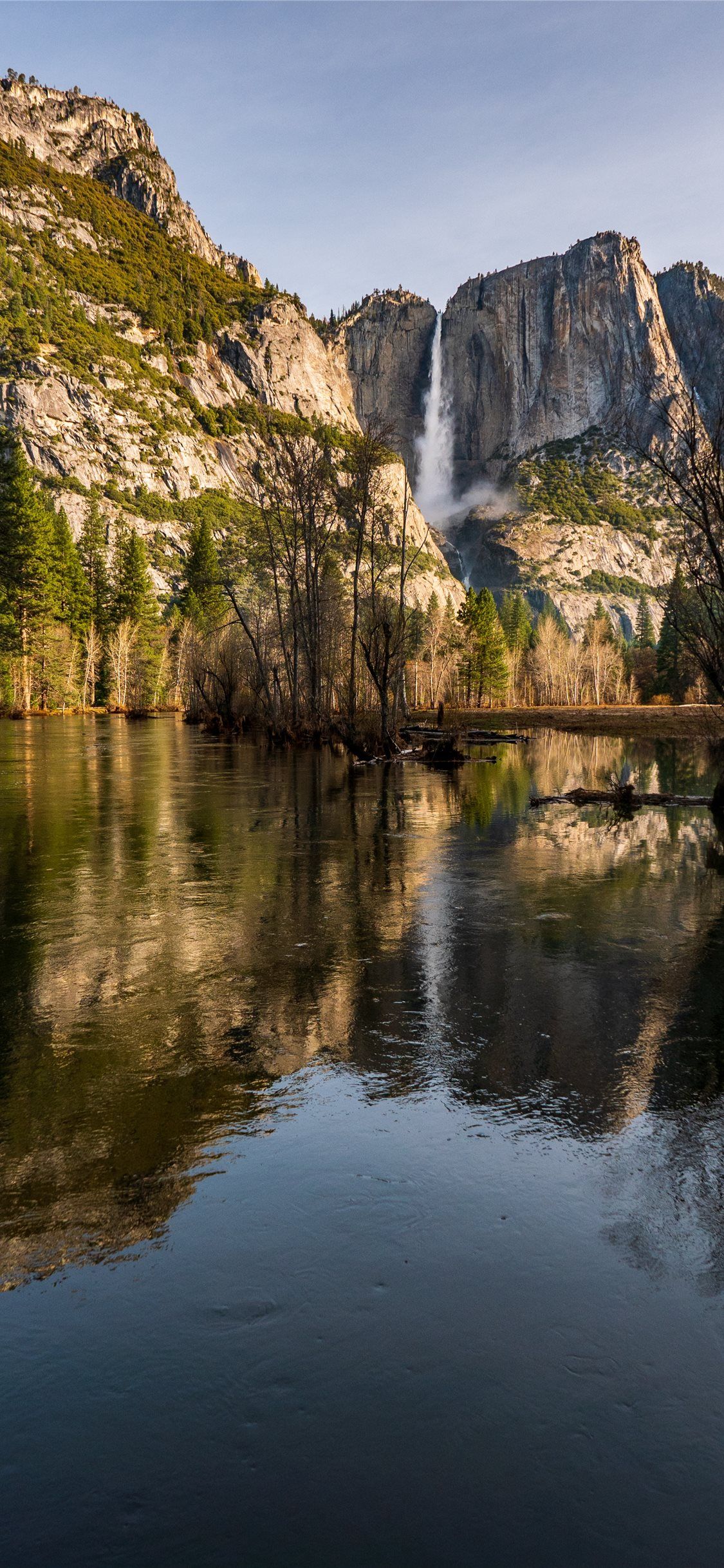 The reflection of Yosemite Falls appears in spring. iPhone X Wallpaper Free Download