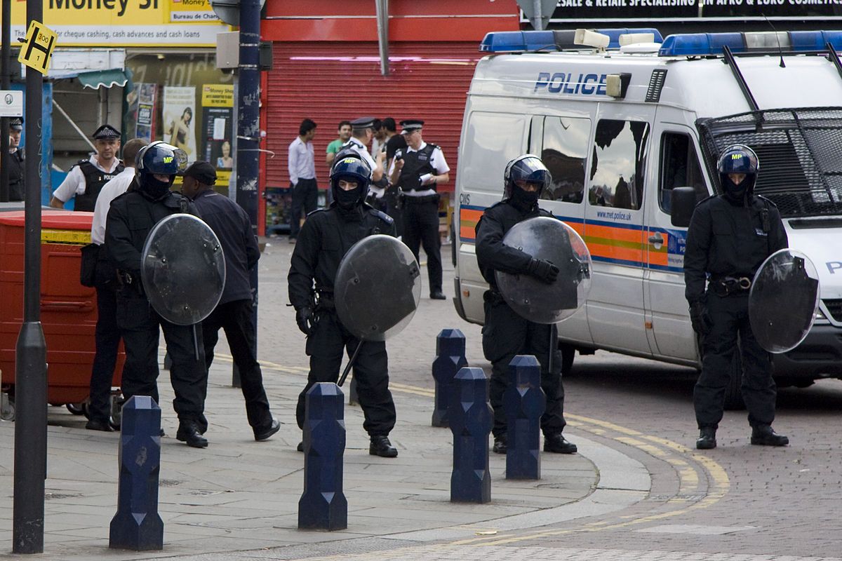 Police with riot shields in Lewisham