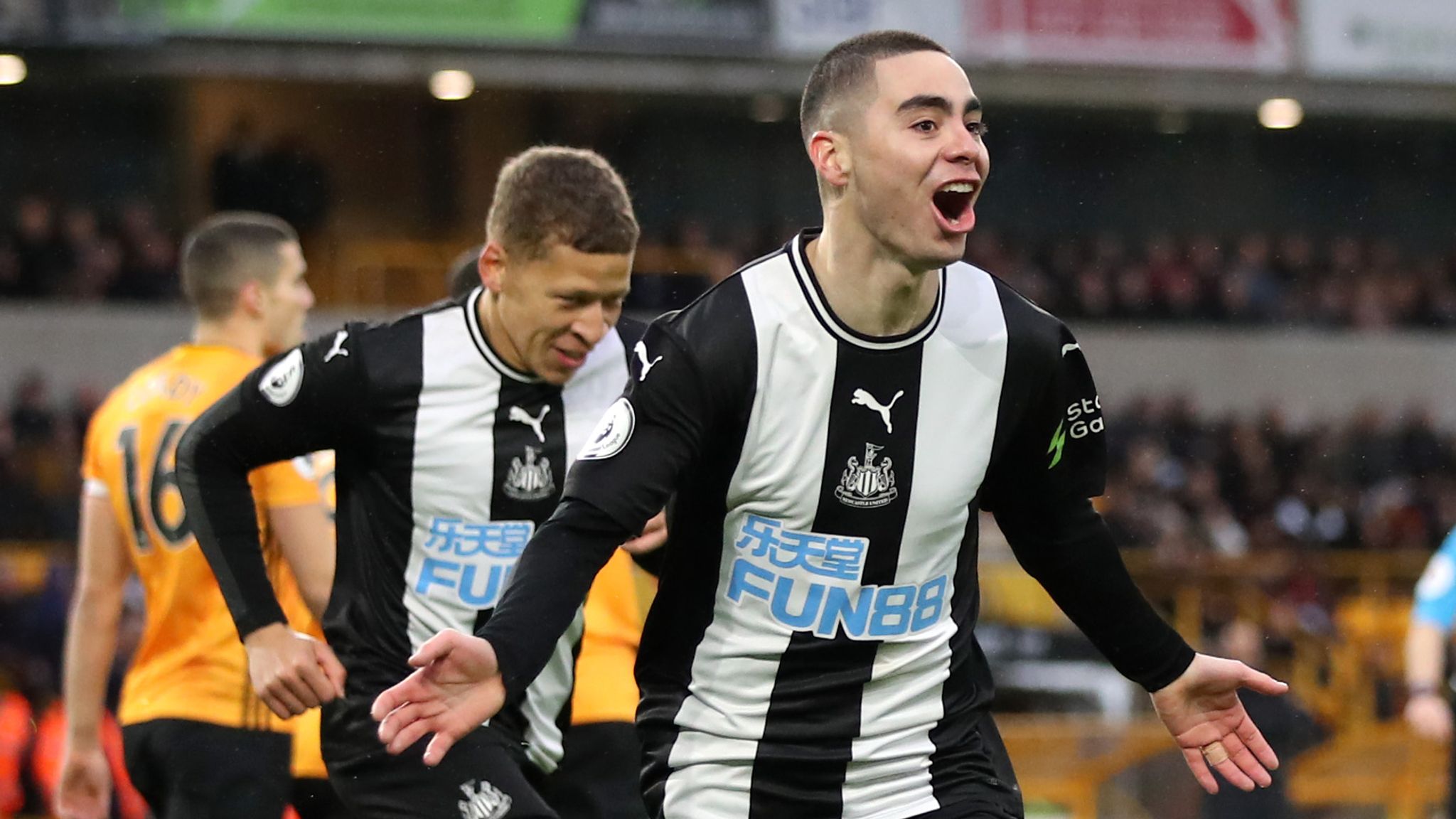  The image shows Newcastle United players celebrating a goal in 1996.