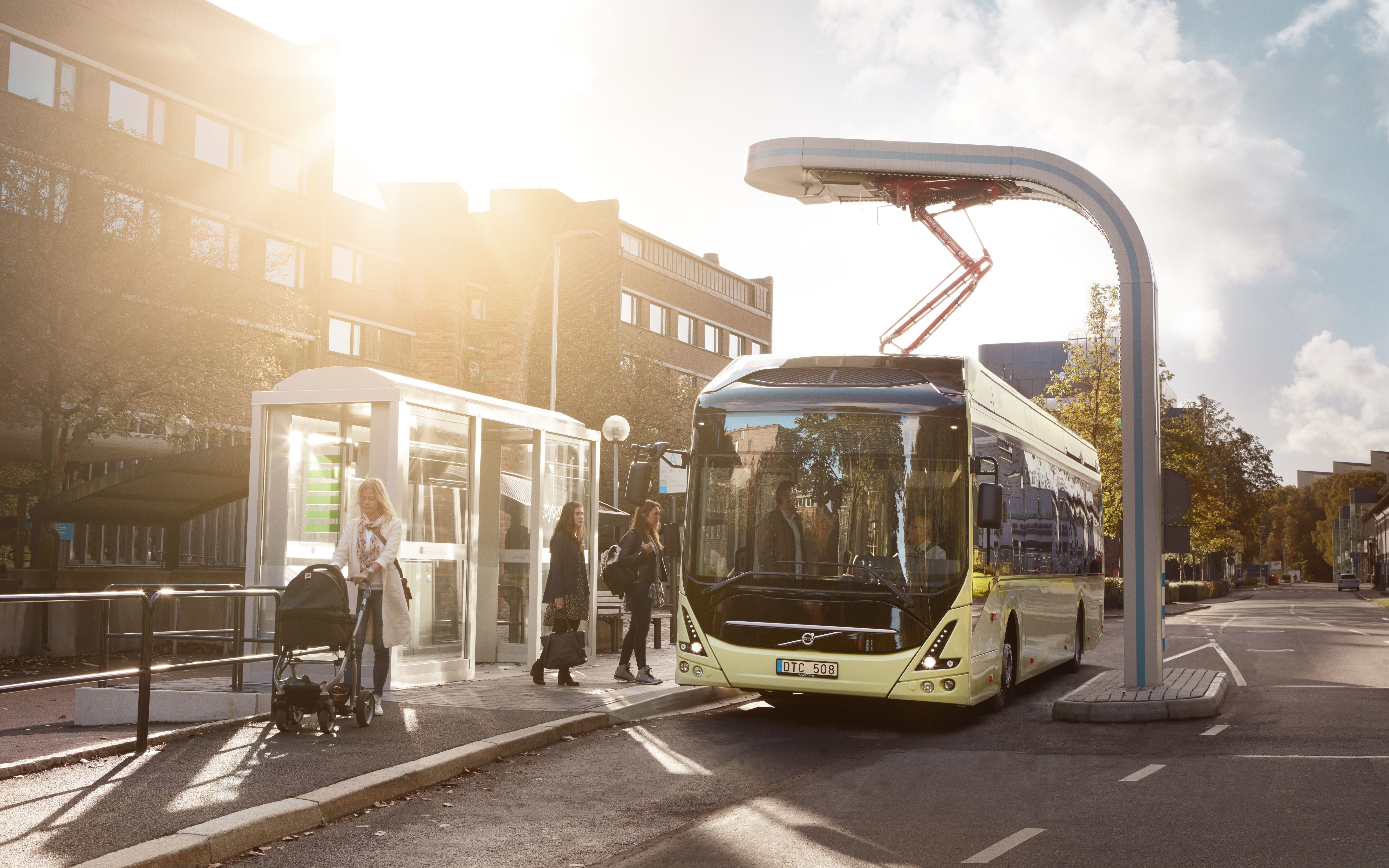 Download wallpaper electric bus, Volvo 7900 Electric, modern buses, bus stop, recharging, passenger transportation, Volvo for desktop with resolution 5760x3600. High Quality HD picture wallpaper