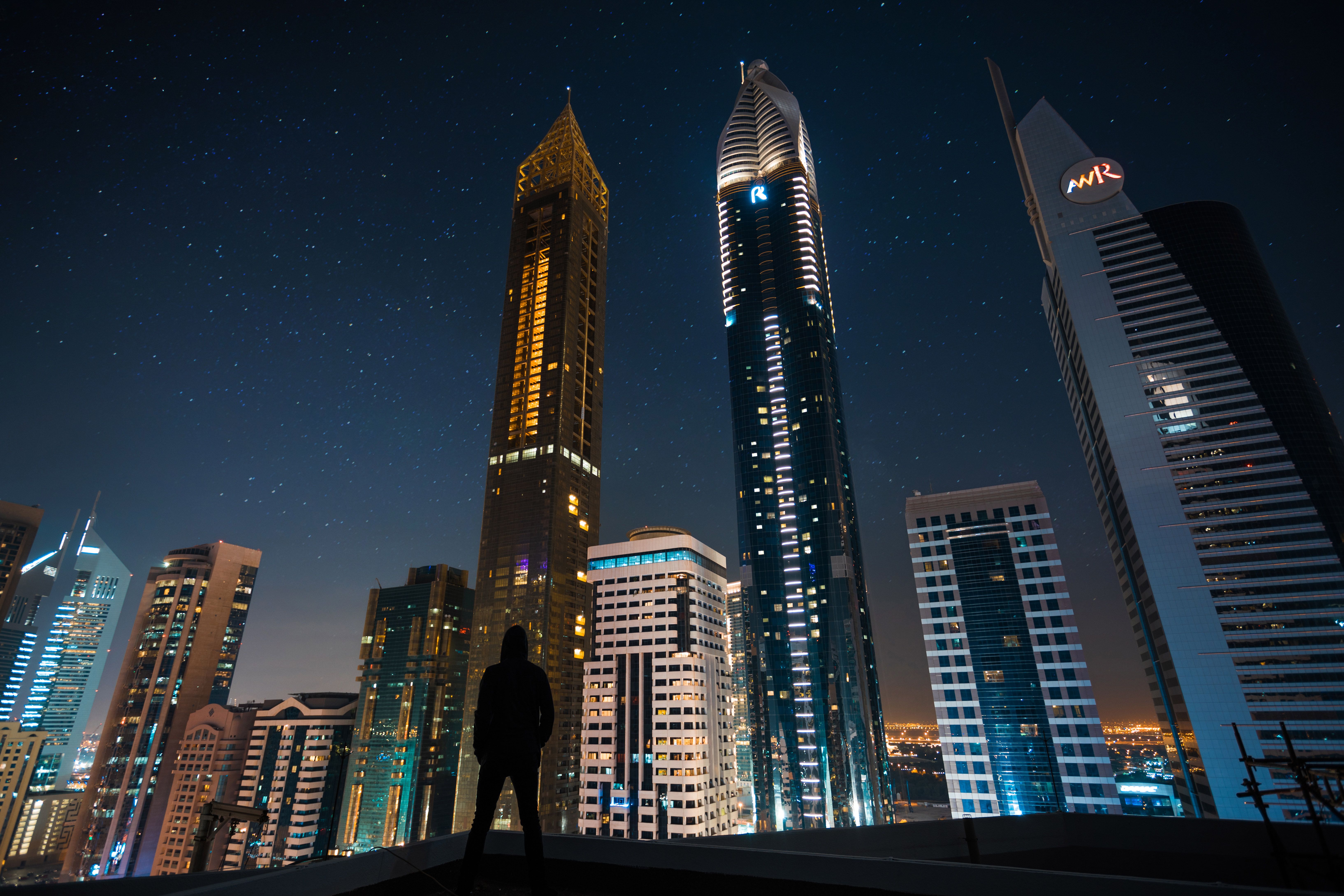 Man Standing Front Of Tall Buildings, HD Photography, 4k Wallpaper, Image, Background, Photo and Picture