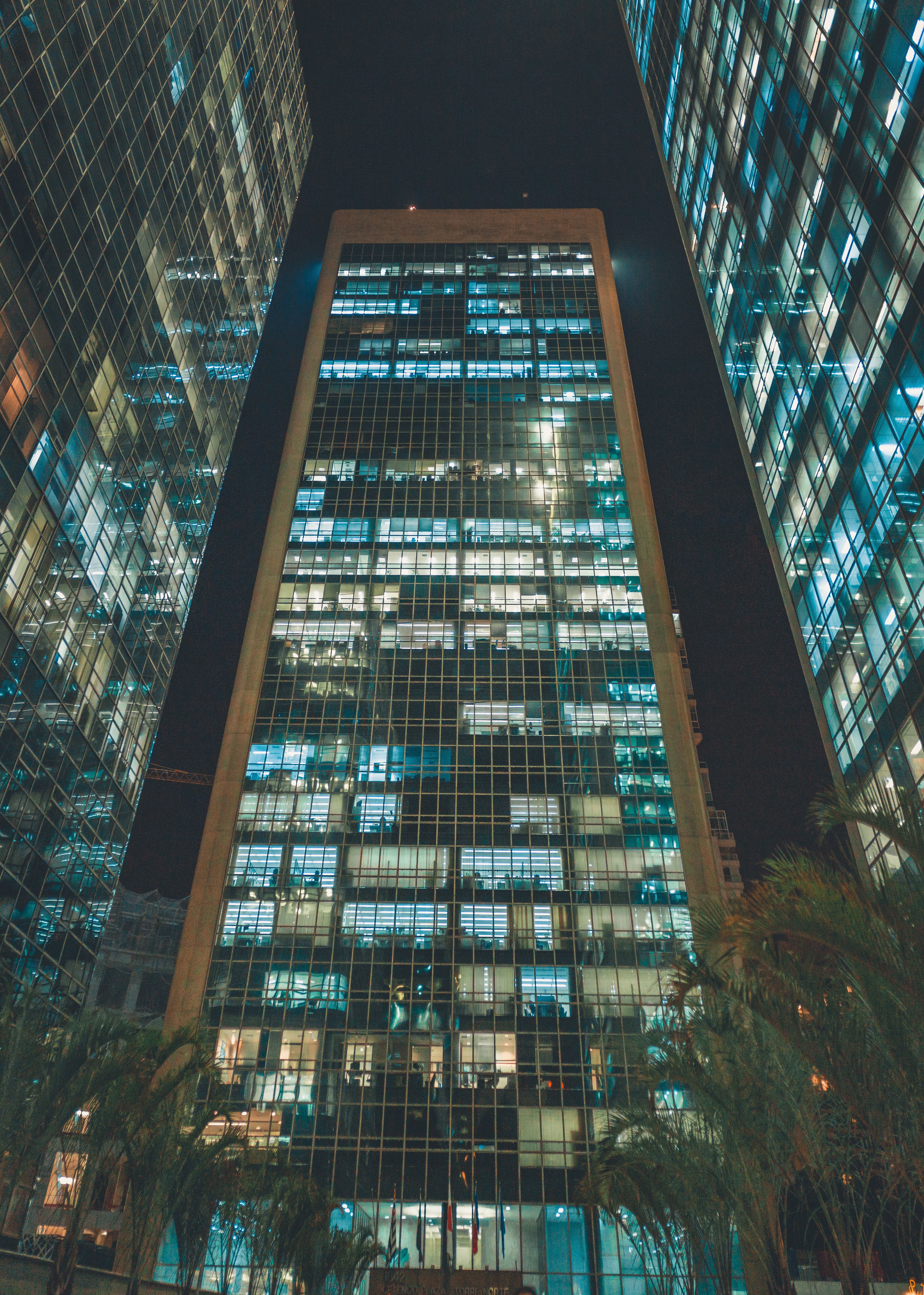 Tall Buildings At Night Time · Free