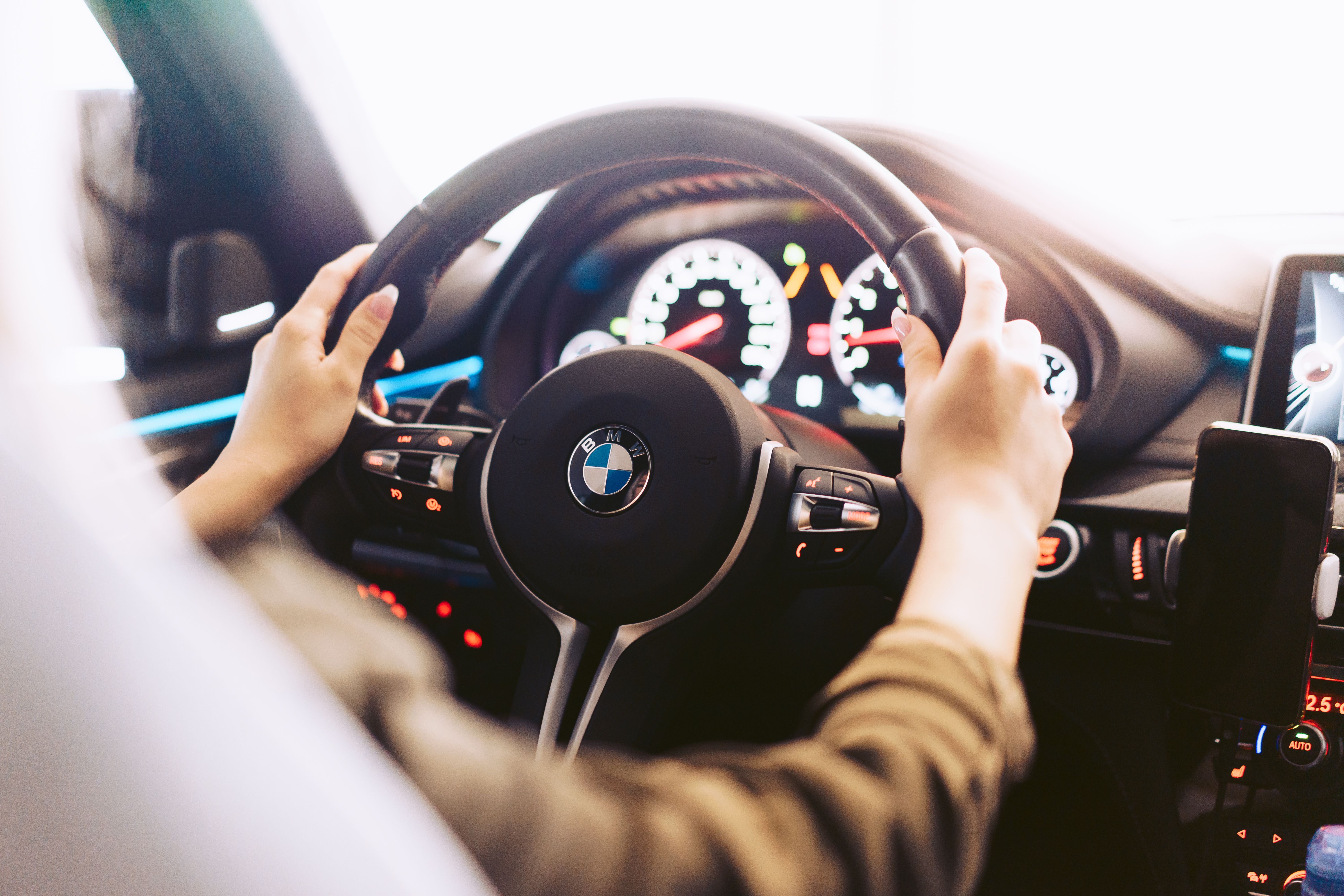 Woman Driving a Luxury Sports Car Free