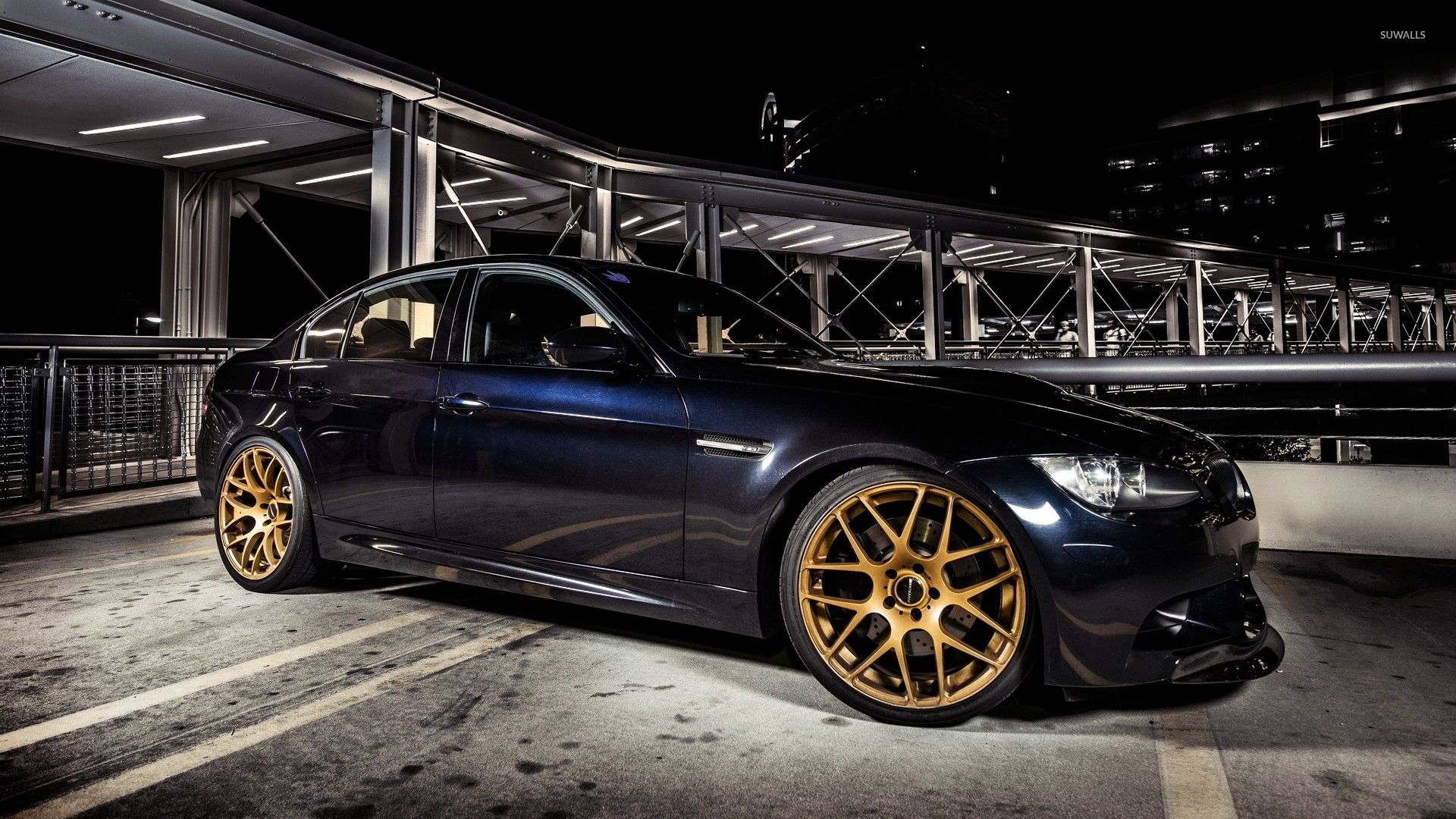 Golden rims on a BMW M3 with wallpaper wallpaper