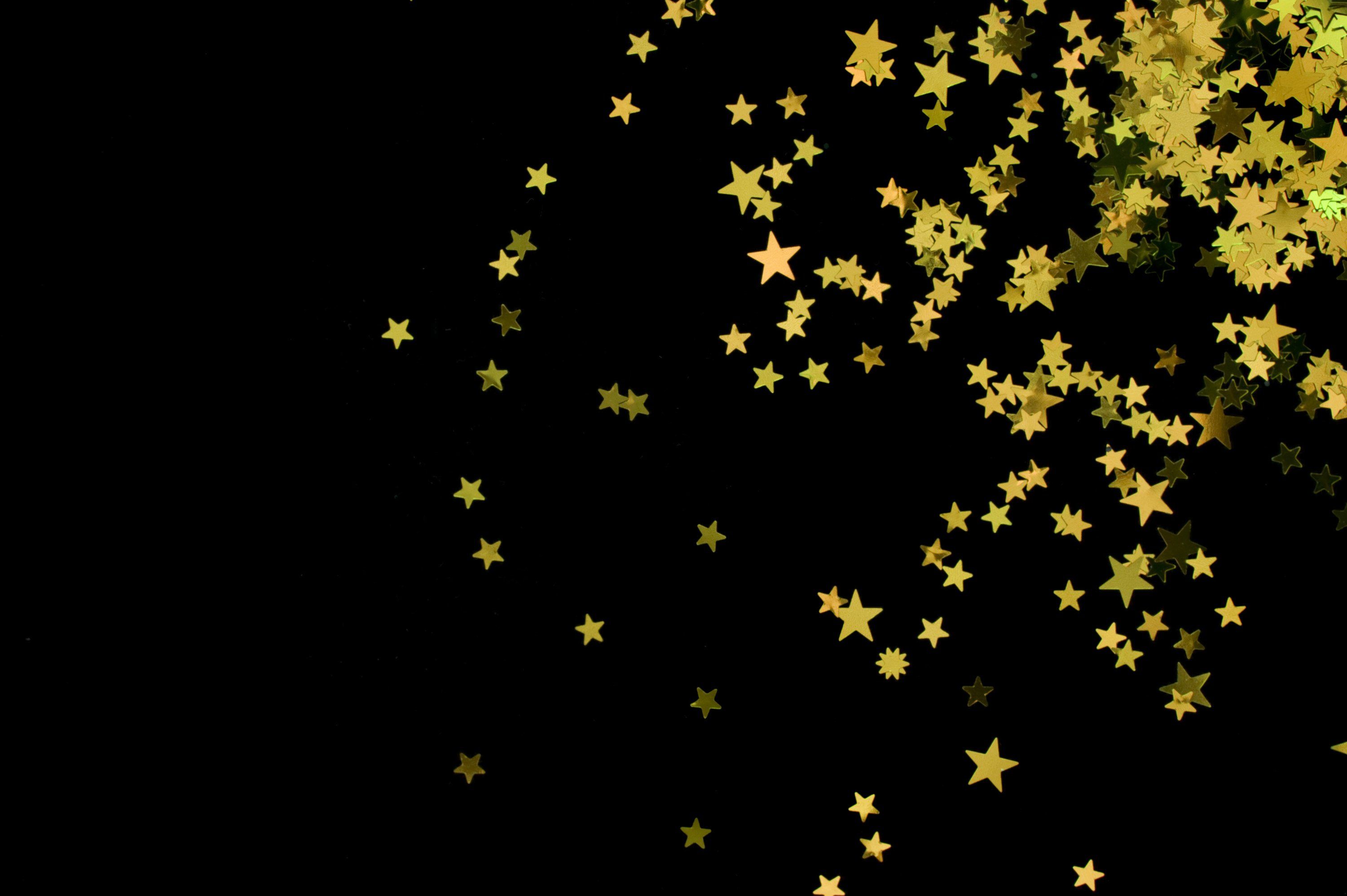 Free download scattering of yellow coloured glitter star shapes on a black backdrop [3000x1996] for your Desktop, Mobile & Tablet. Explore Gold Star Wallpaper. Star Wallpaper for Walls, Gold