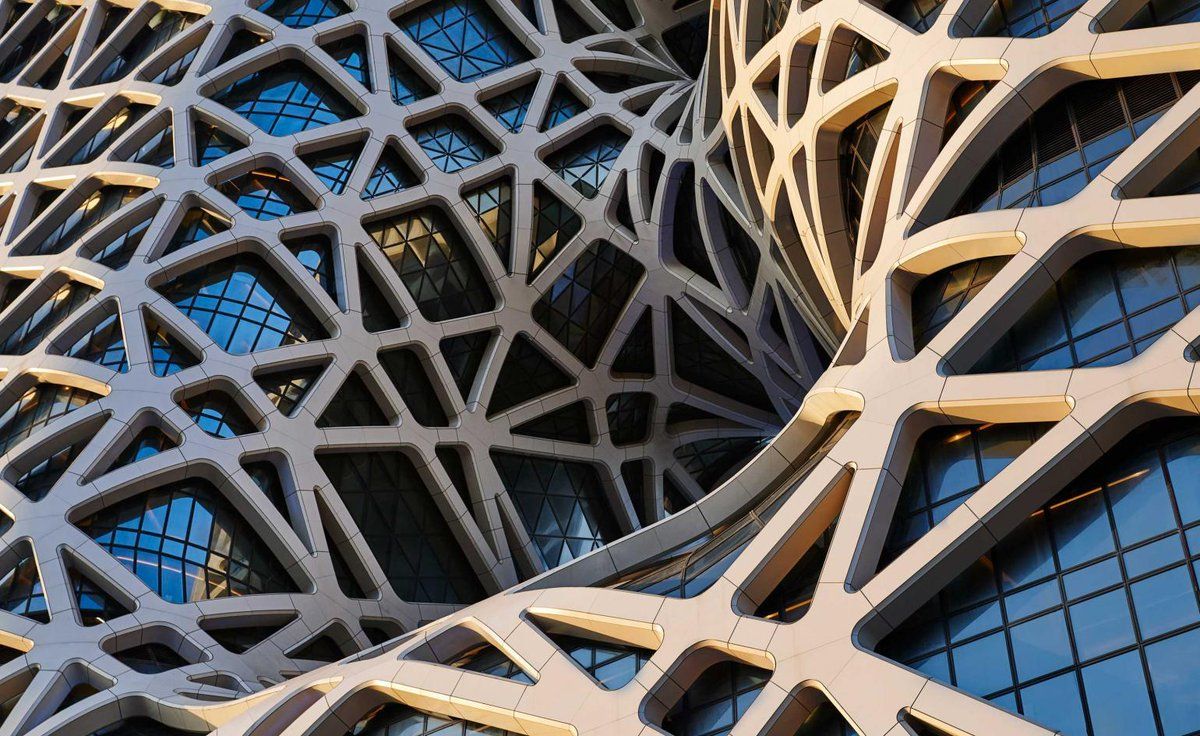 Wallpaper* Zaha Hadid Architects Designed Building Features A Freeform Exoskeleton That Rises From Ground Level, Wrapping Around A Pair Of Towers