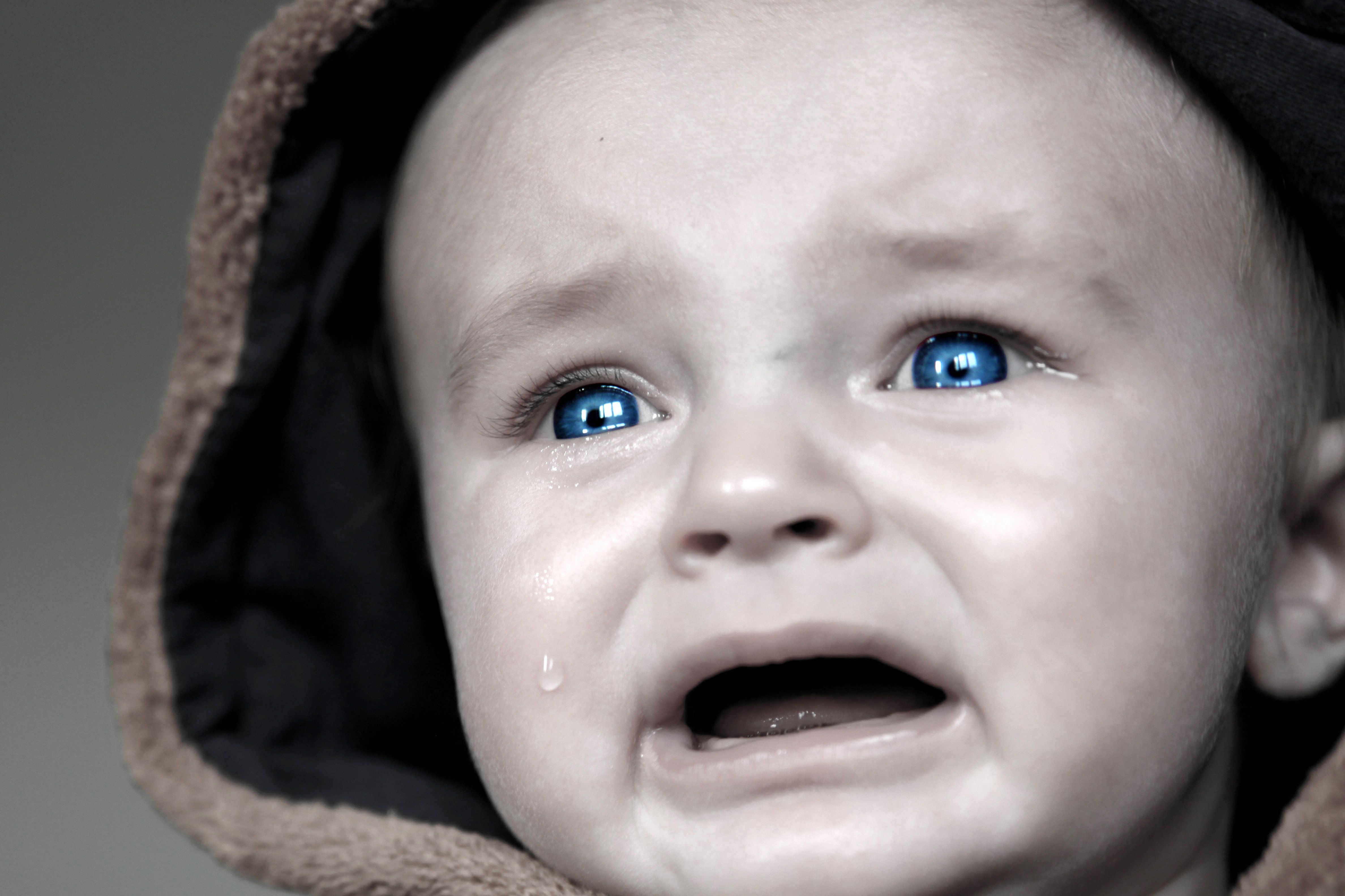 Teardrop From Crying Baby With Blue Eyes Image Domain Photo