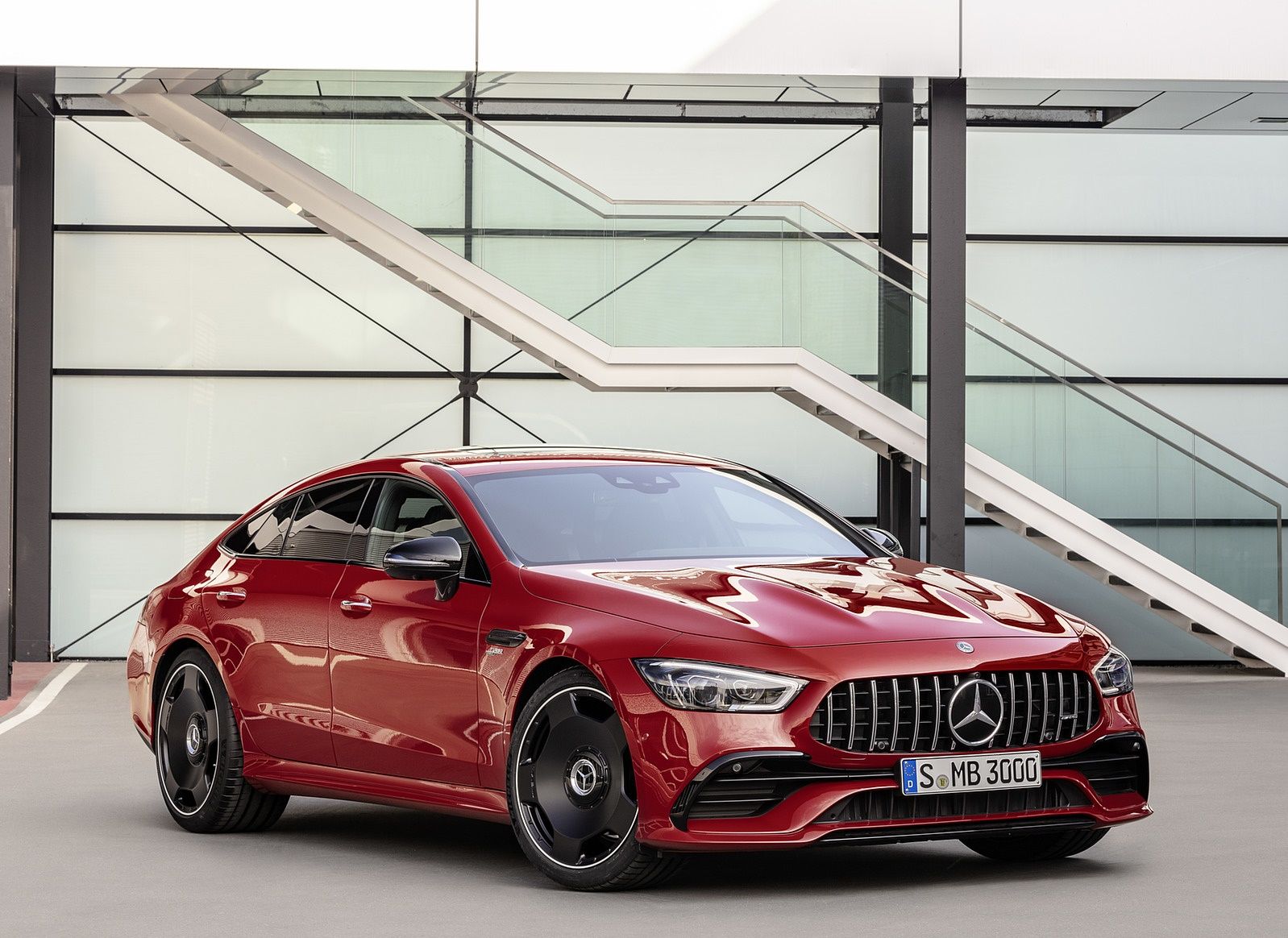 Mercedes AMG GT 43 4MATIC+ 4 Door Coupé (Color: Jupiter Red) Front Three Quarter Wallpaper