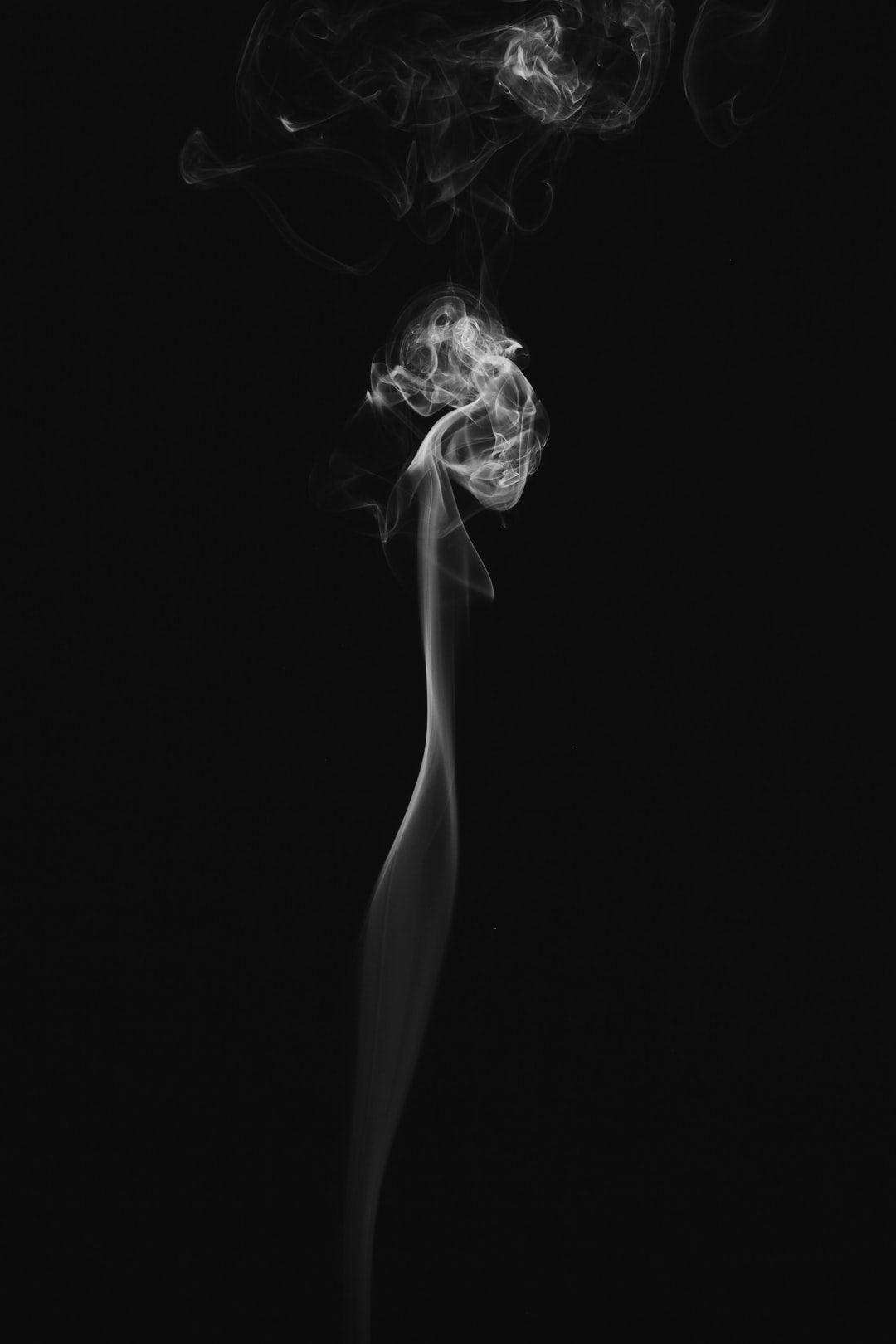 white smoke with black background photo