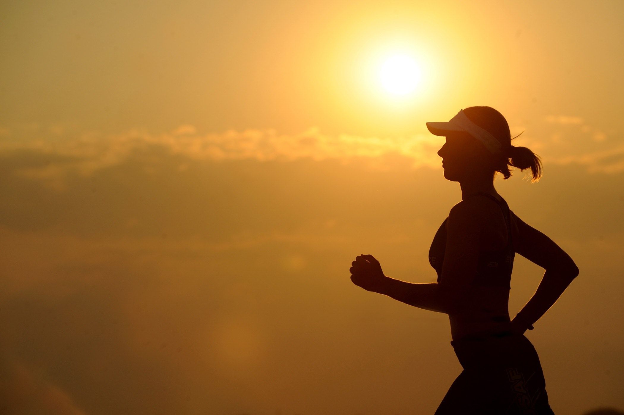 Woman With White Sunvisor Running · Free