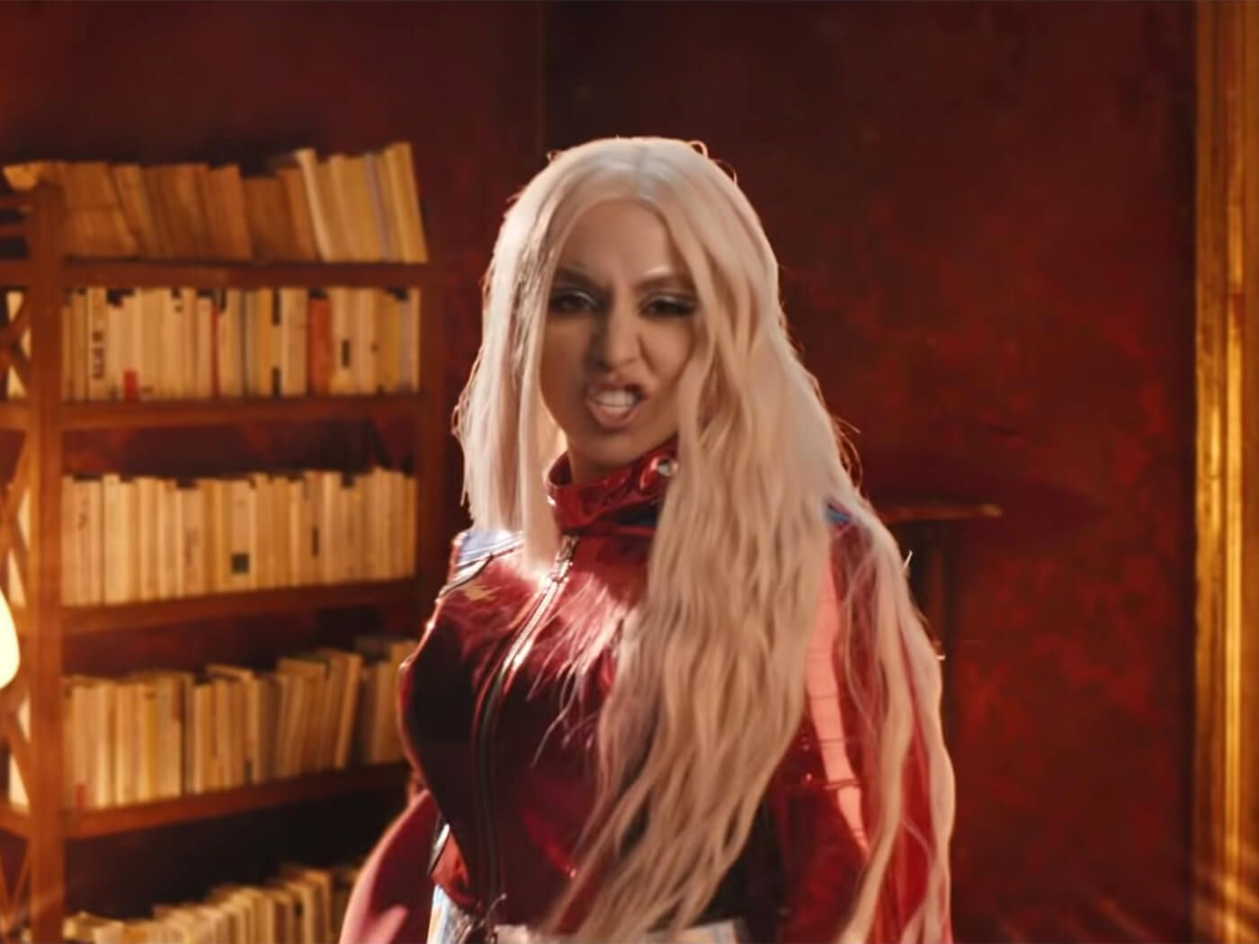 Ava Max transforms into a superhero in video for “Torn”