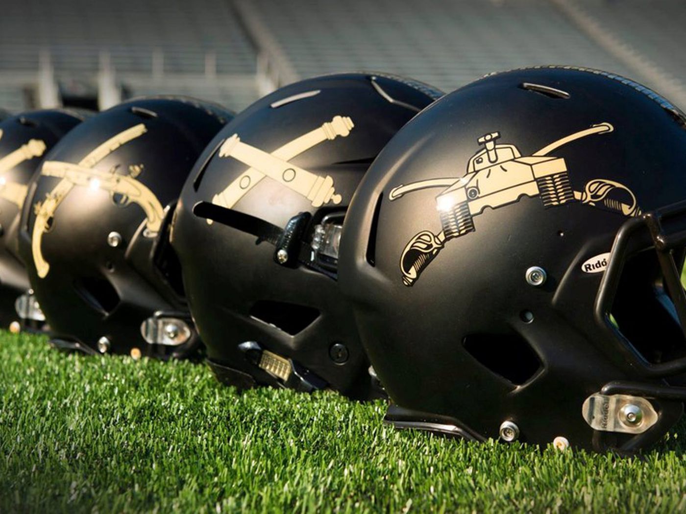 Army's awesome helmets for the Navy game, with different military insignia for each position