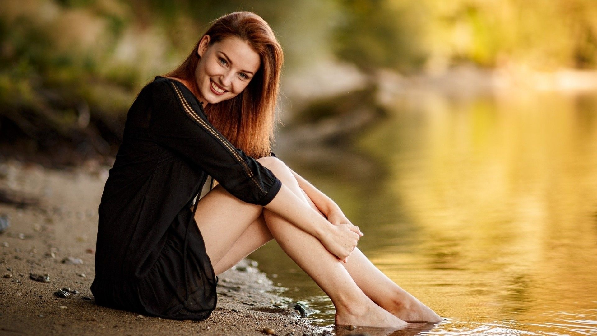 Download 1920x1080 Redhead, Smiling, Sitting, Water, Model, Women, Long Hair, Legs Wallpaper for Widescreen