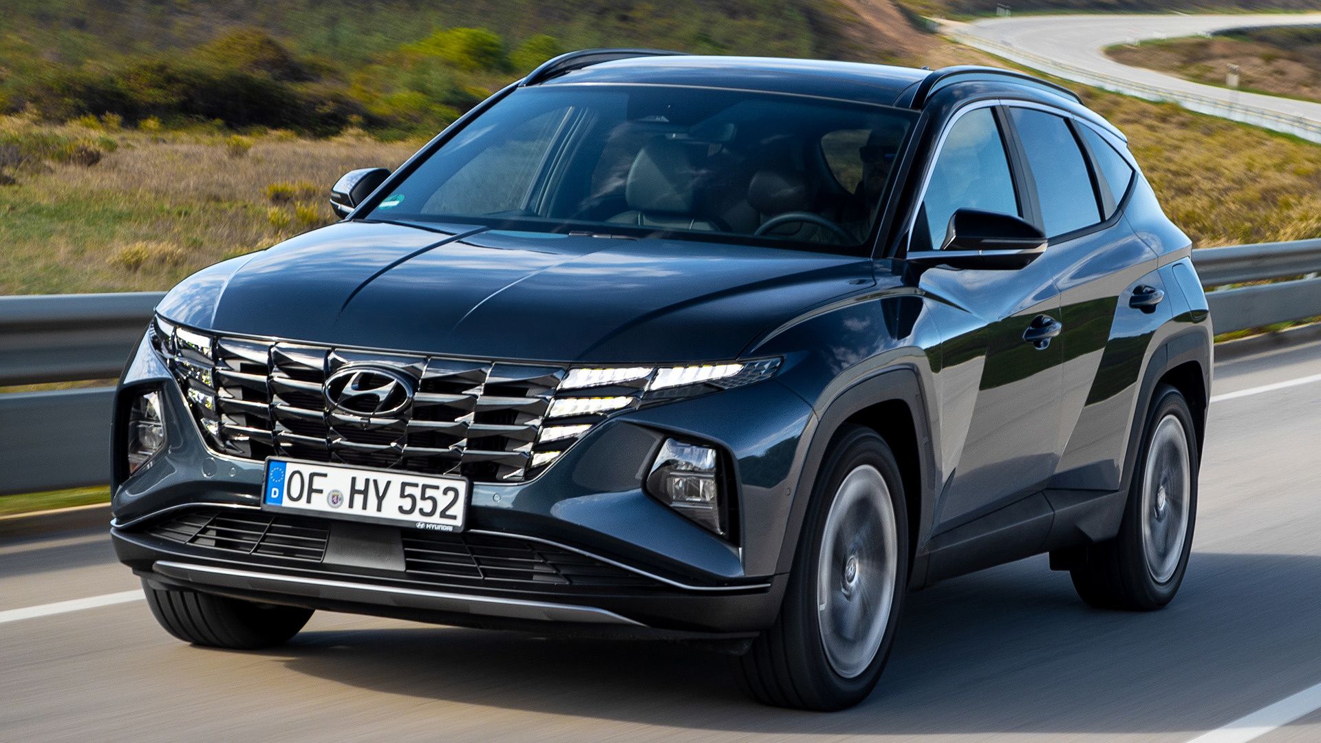 Hyundai Tucson Hybrid and HD Image