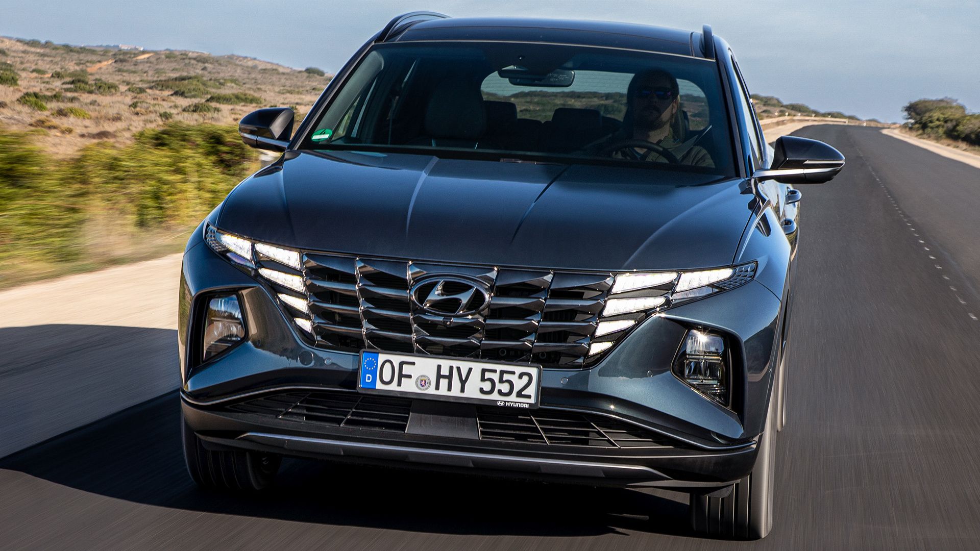 Hyundai Tucson Hybrid and HD Image