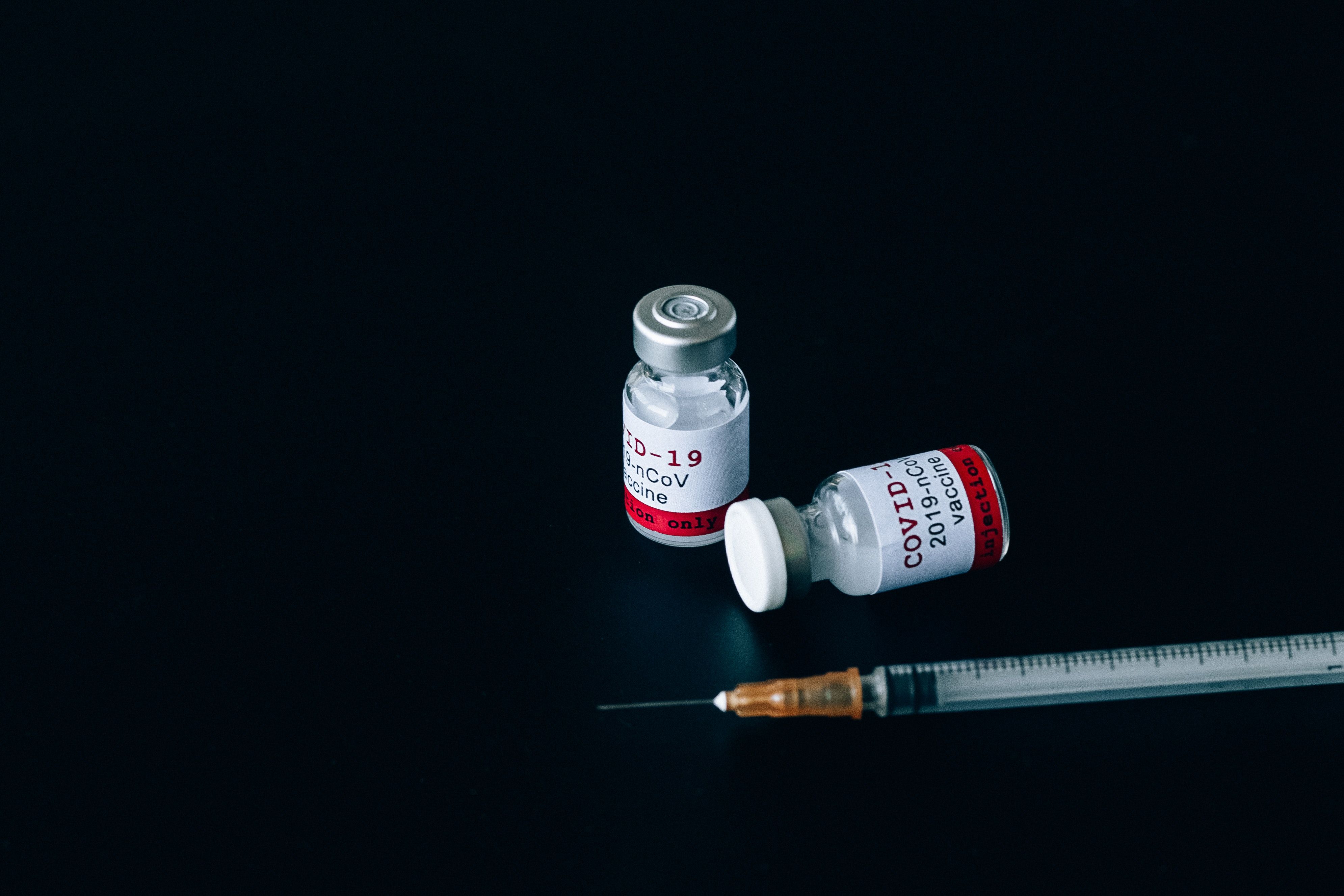 Covid 19 Vaccine In Vials And Injection · Free