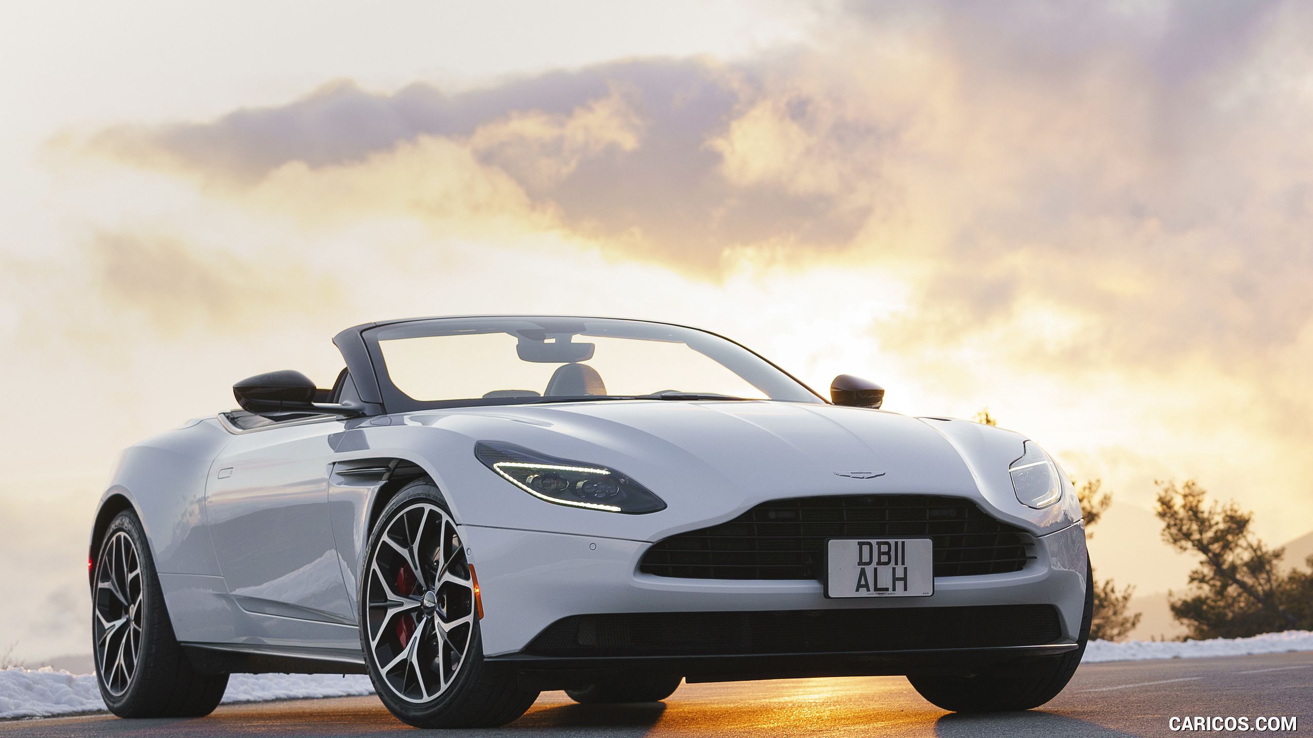 Aston Martin DB11 Volante V8 (Color: Lunar White) Three Quarter. HD Wallpaper