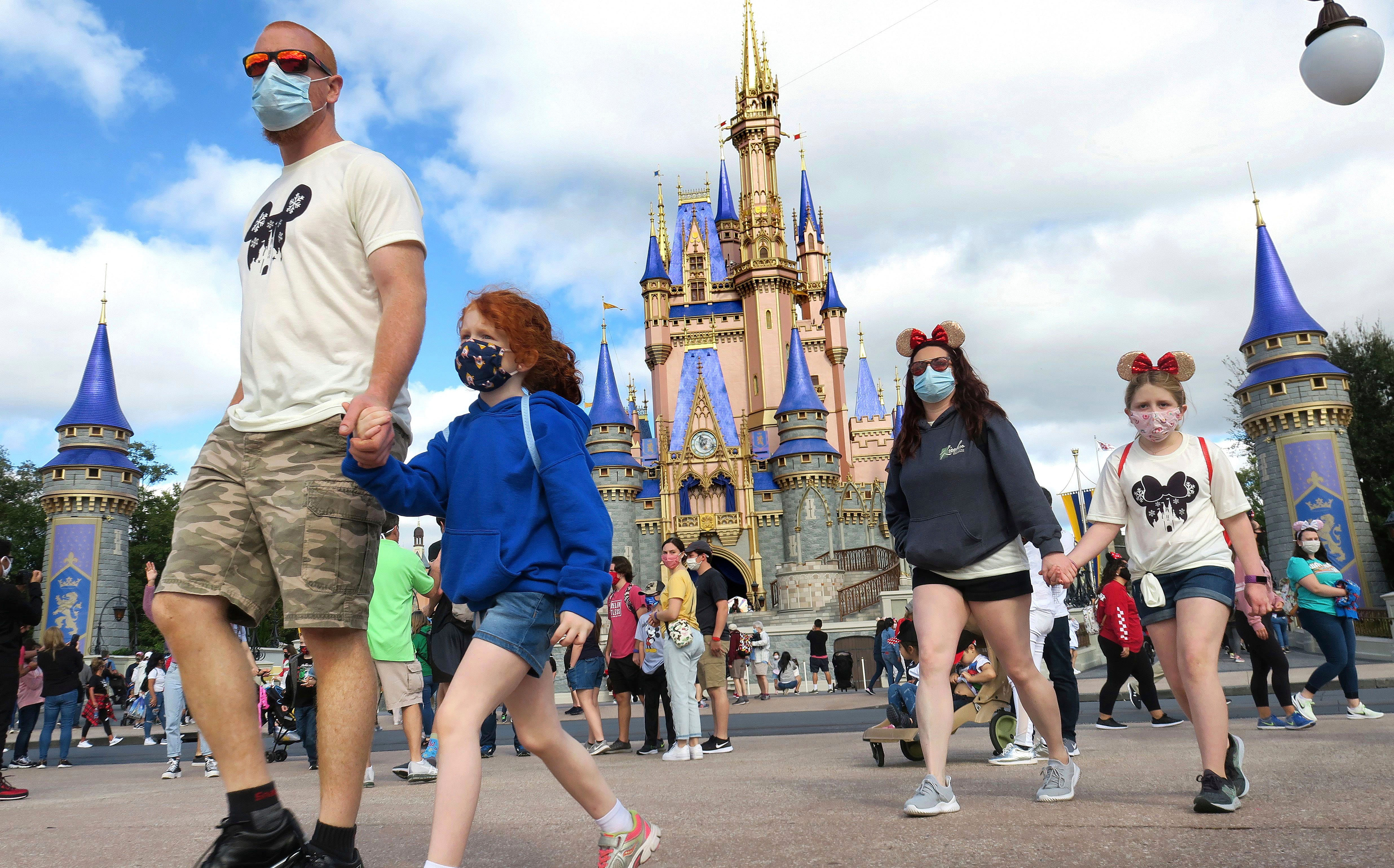 Walt Disney World relaxes COVID mask restrictions for outdoor photo