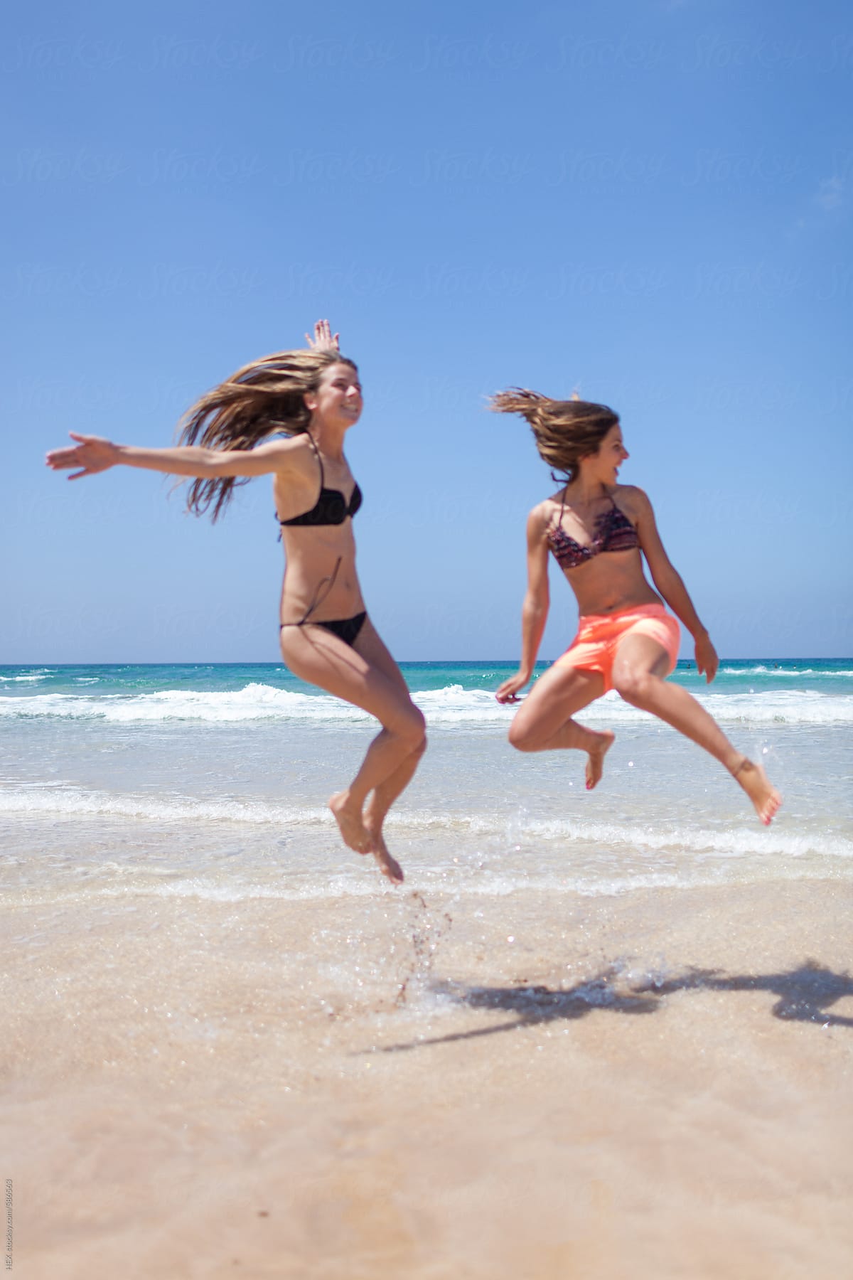Best Friends Having Fun On The Beach. Summer Holiday