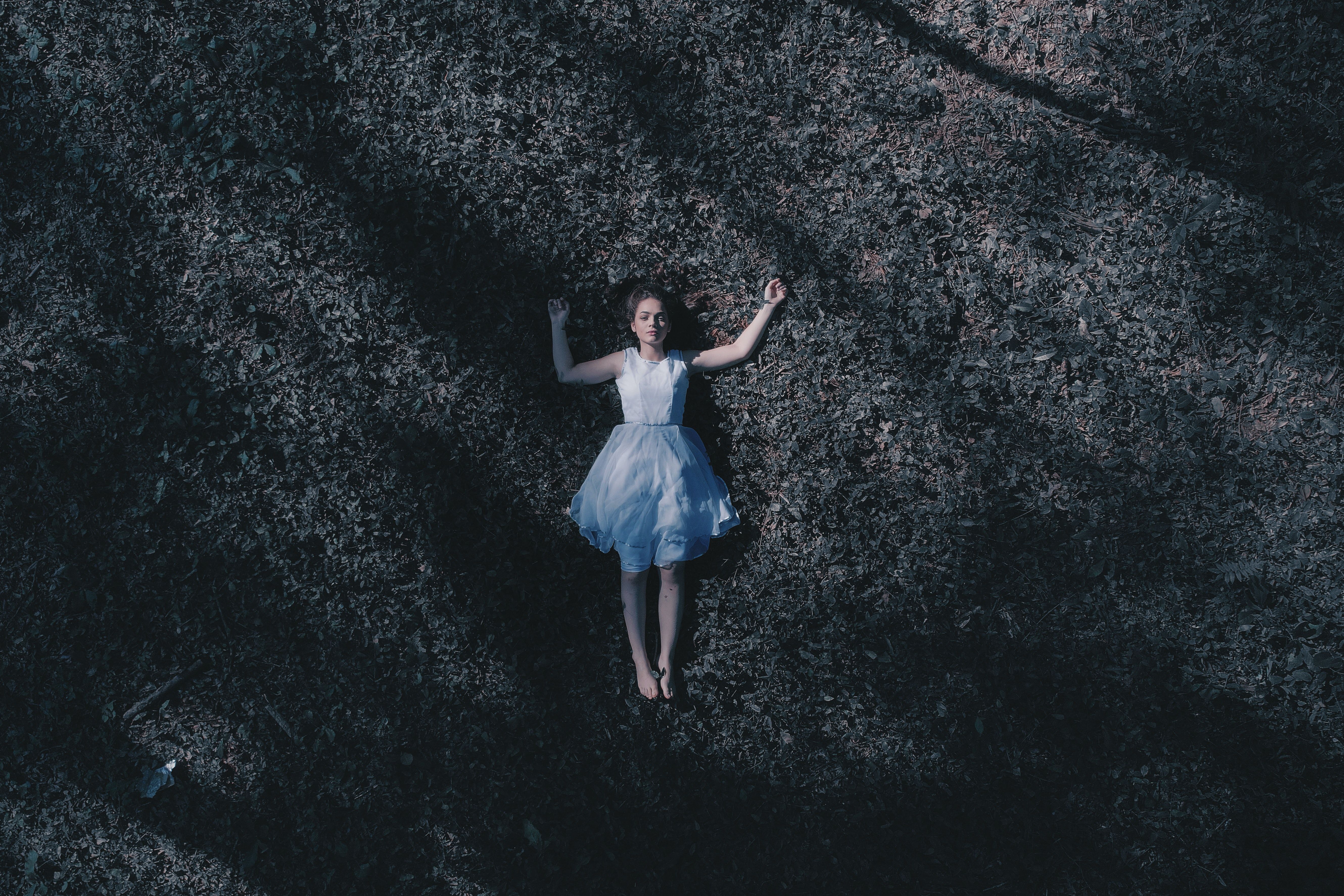 Woman Laying Down On Ground · Free