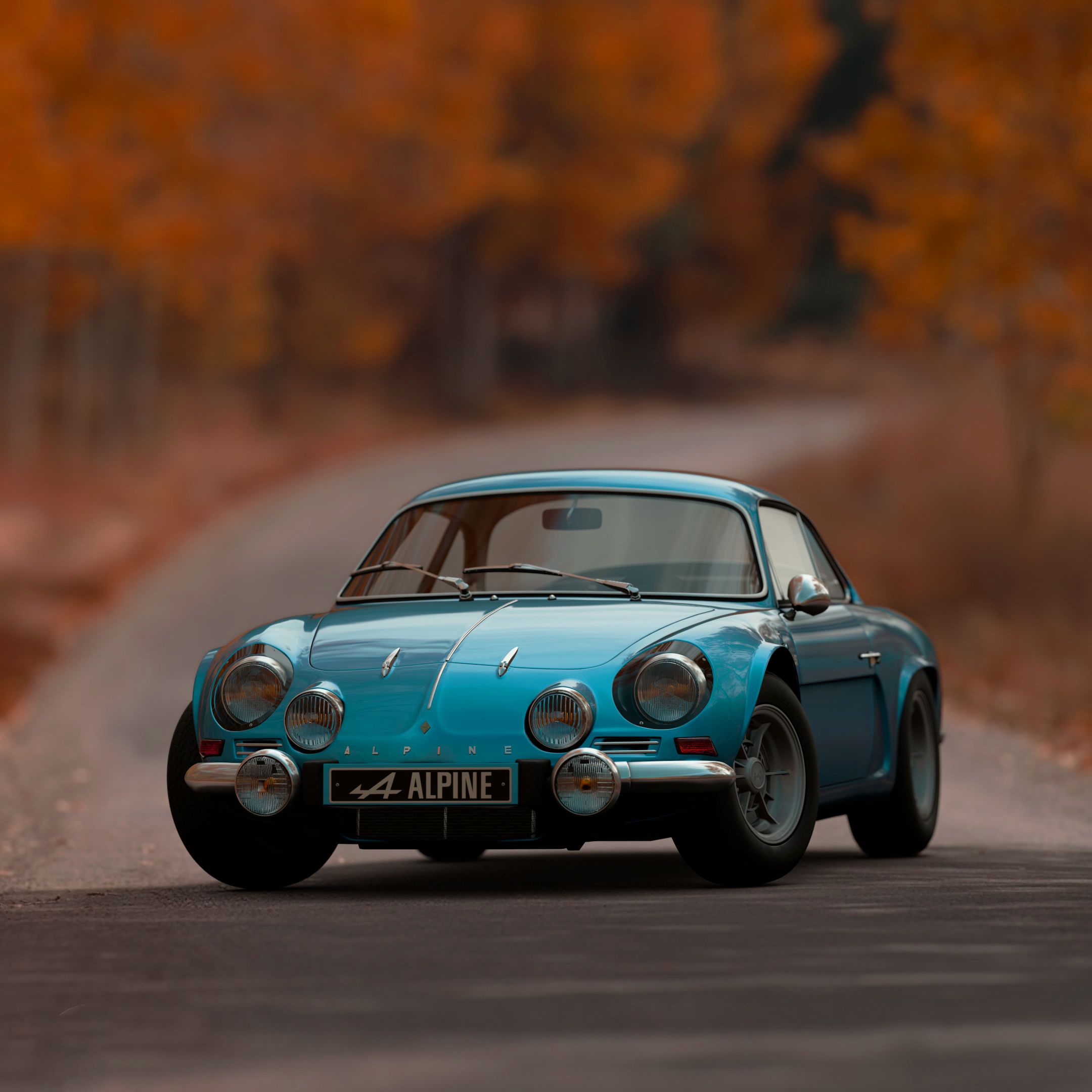 Shallow Focus Photography of Blue Alpine Car · Free