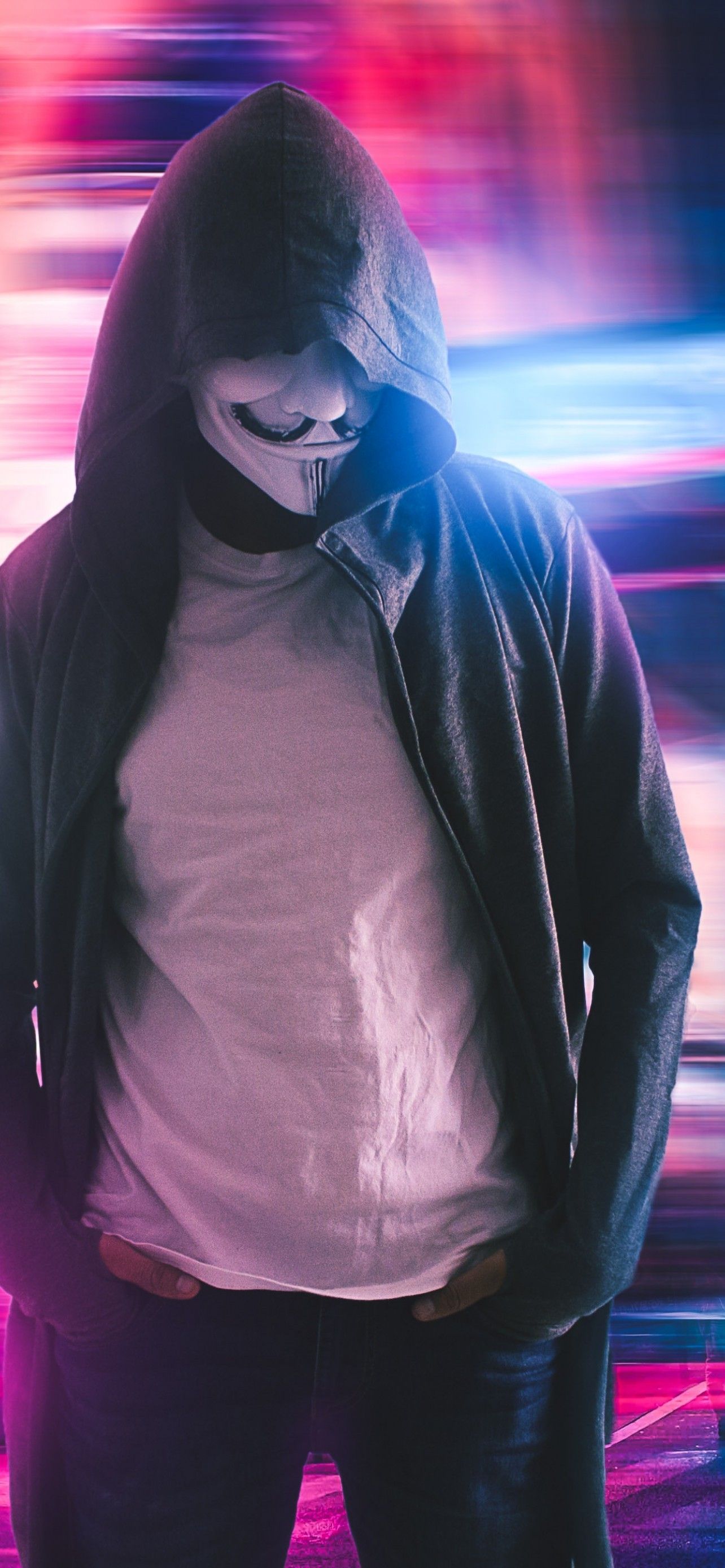 Download 1284x2778 Masked Man, Anonymous, Hoodie, Hacker, Neon City Wallpapers for iPhone 12 Pro Max