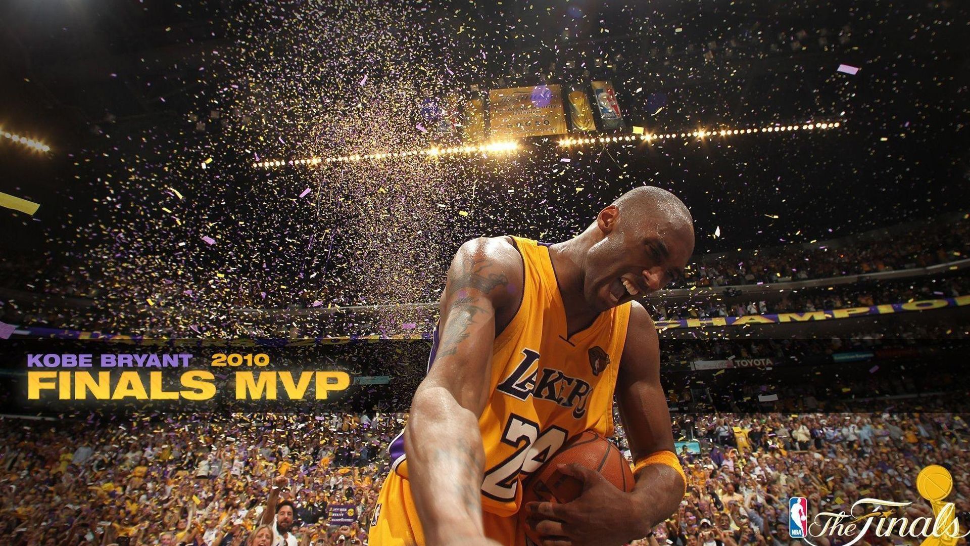 Kobe Bean Bryant With A Back In Background Of People And Lights HD Kobe Bean Bryant Wallpaper