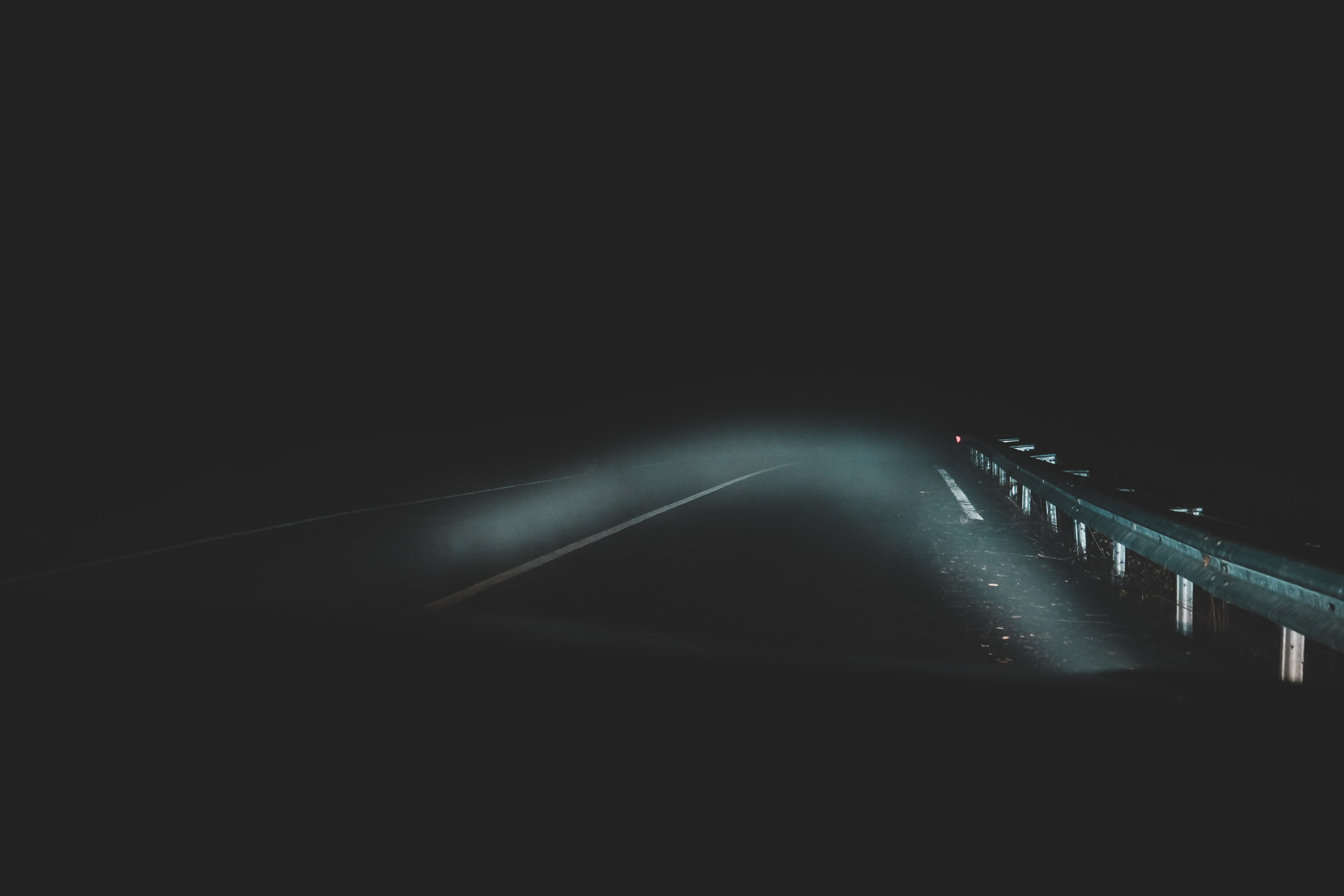 Car Running on Dark Road at Night · Free