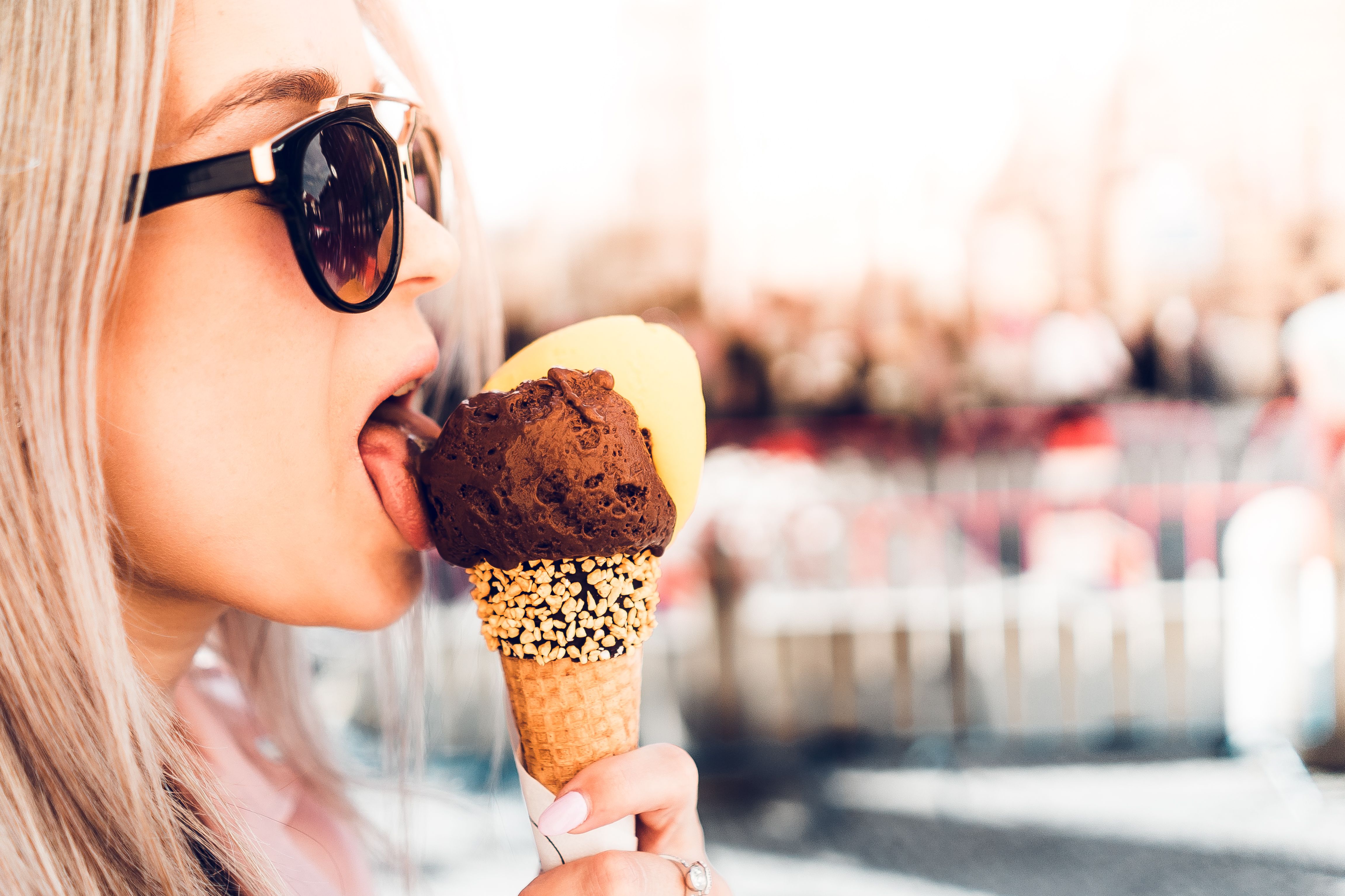 Happy Girl Licking Chocolate Ice Cream in Summer Free