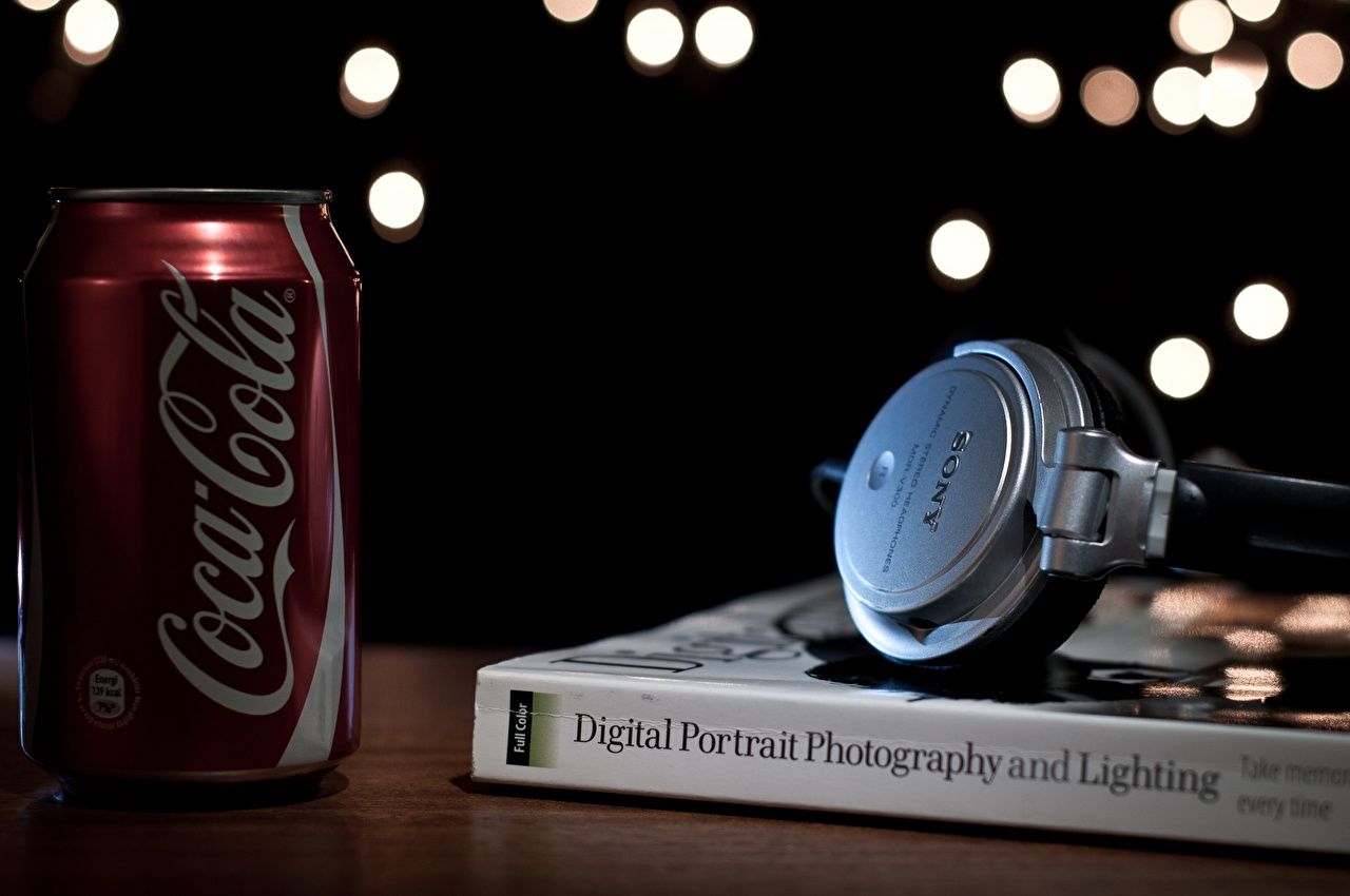 image Coca Cola Headphones Books Closeup