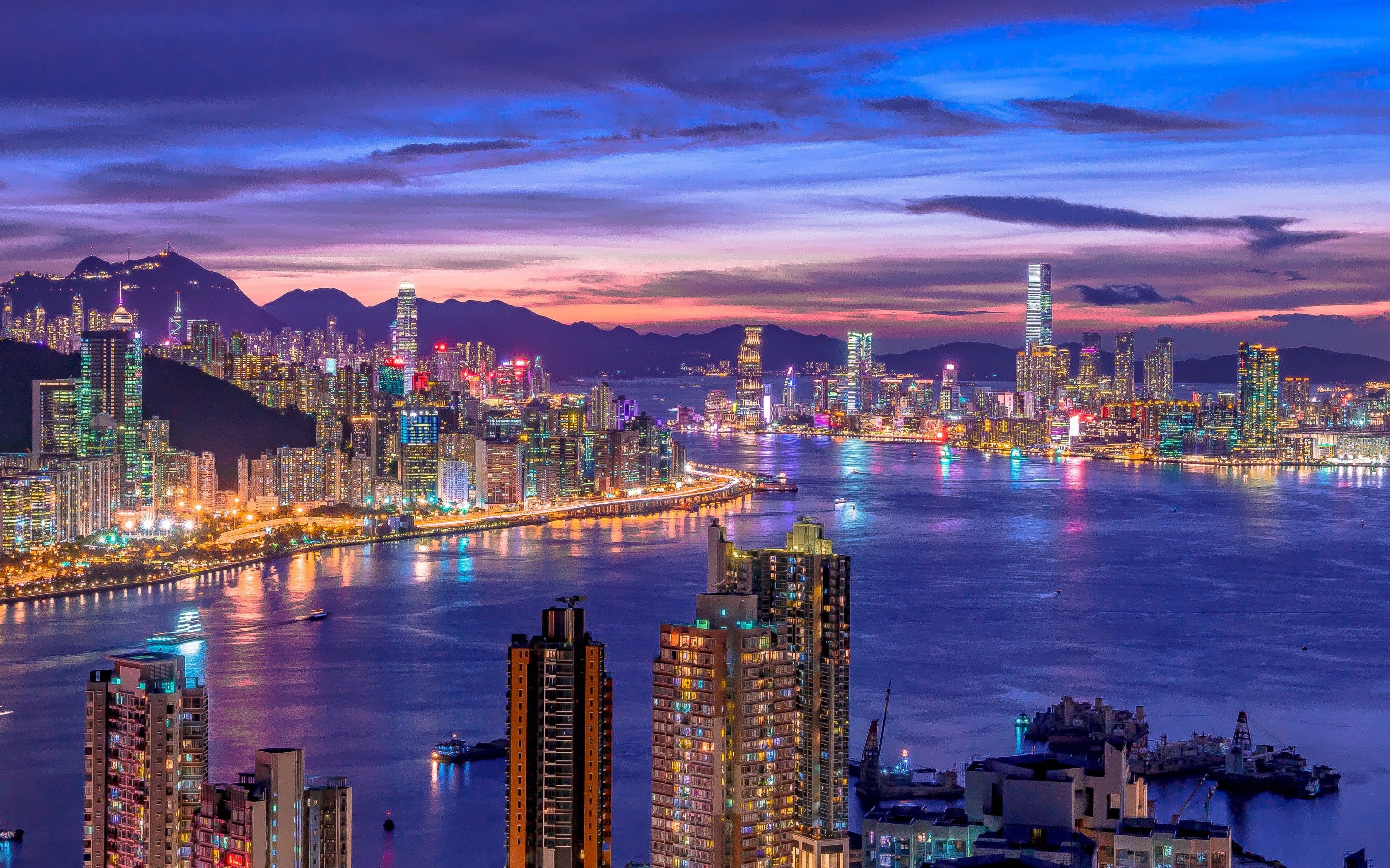 City Skyline 4K Wallpaper, Night life, Cityscape, Hong Kong, Skyscrapers, Purple sky, River, Sunset, World