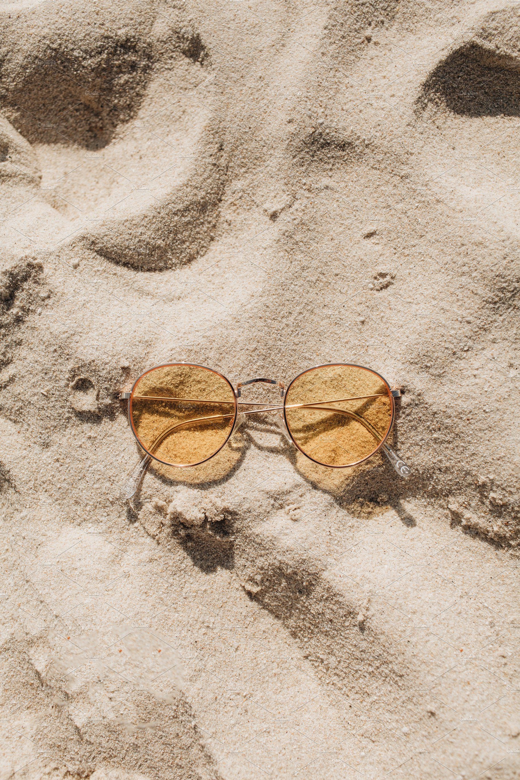 Sunglasses on sand. Beige aesthetic, Brown aesthetic, Beach aesthetic