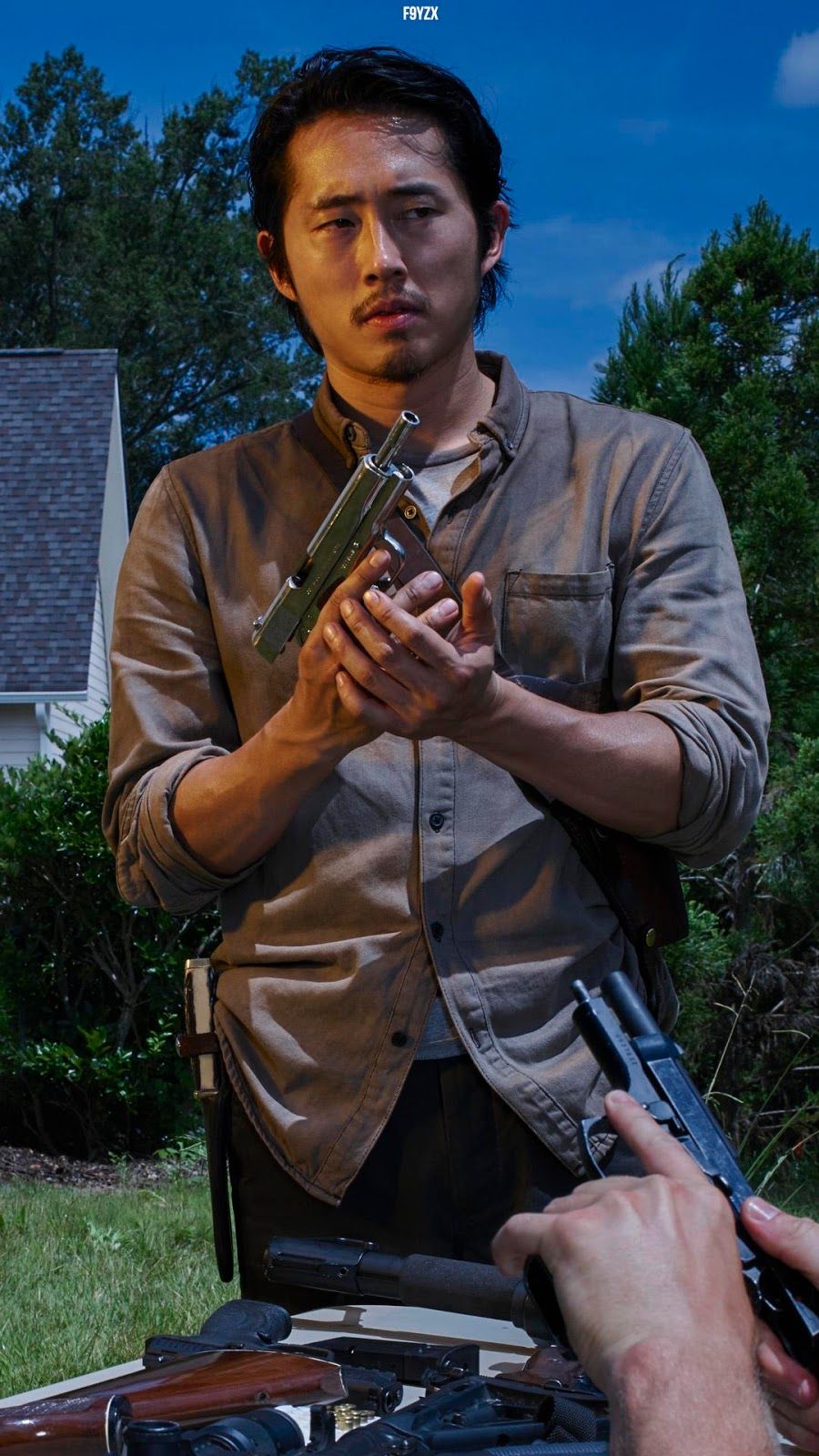 The Walking Dead Wallpaper Dead Glenn Holding Gun