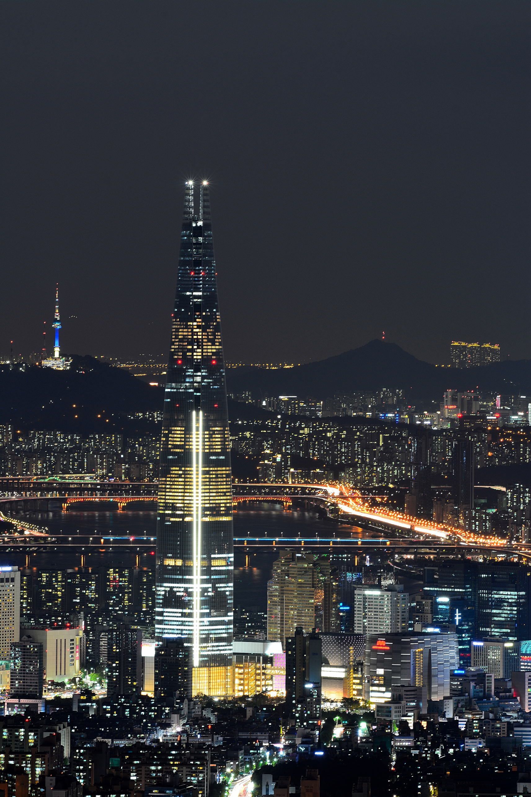 Lotte World Tower and the night lights of Seoul South Korea [17132570]. South korea photography, Seoul night, Seoul korea travel