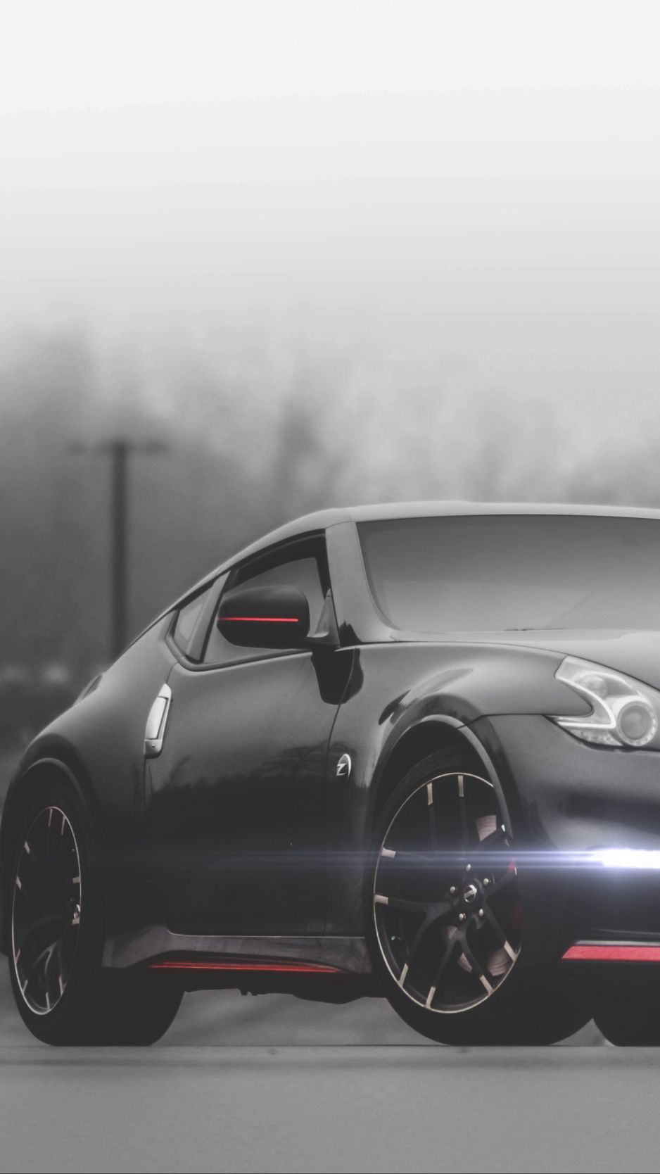 Download Wallpaper 938x1668 Nissan 370z, Nissan, Car, Black, Fog Iphone 8 7 6s 6 For Parallax HD Background