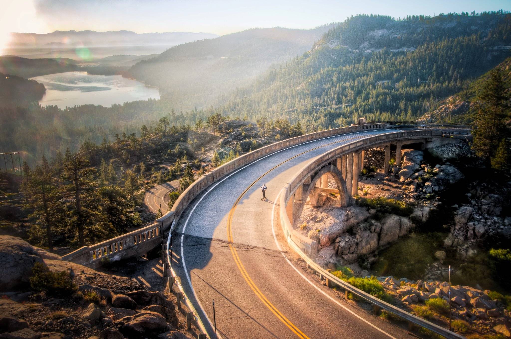 A lone longboarder in paradise