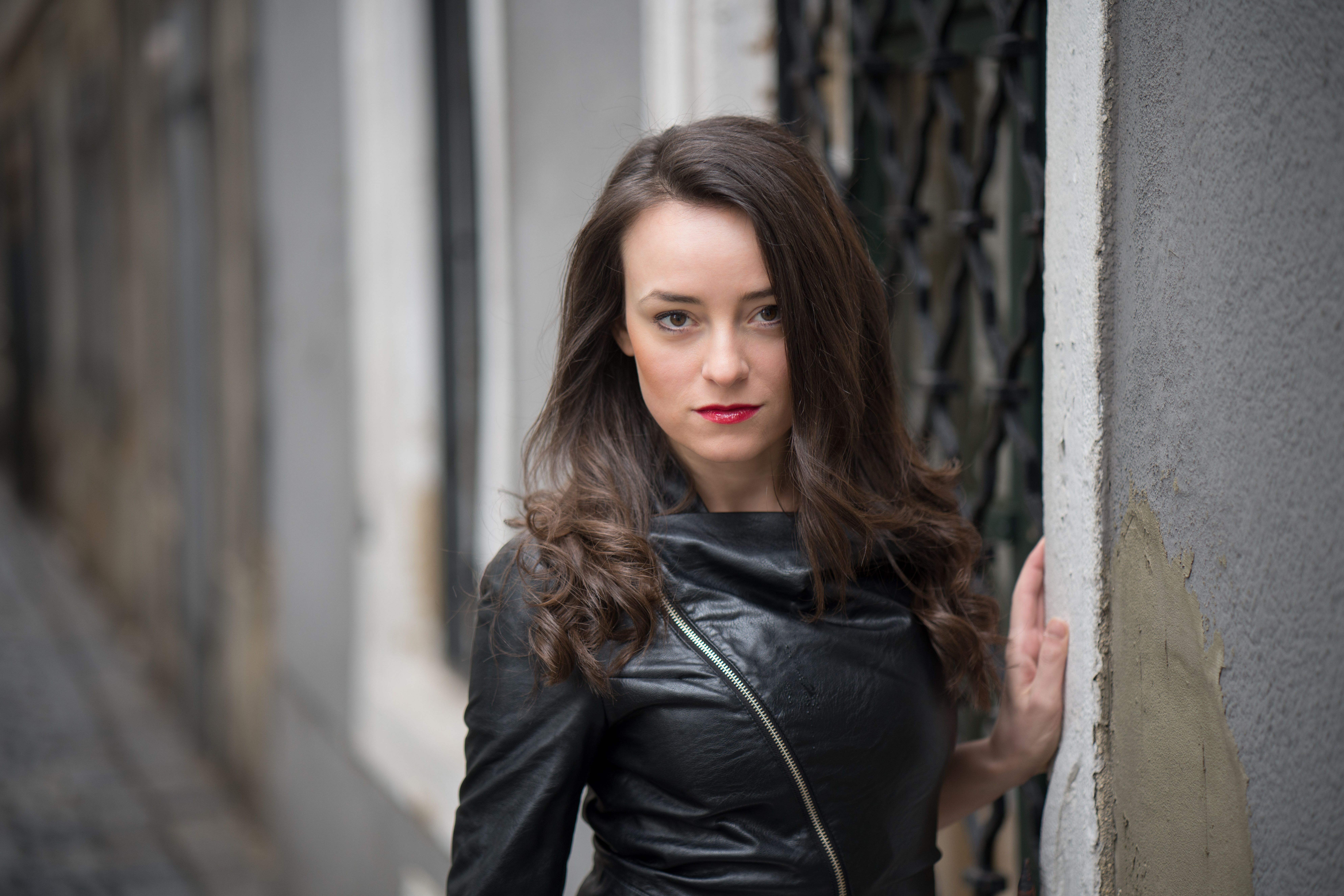 Stylish brunette girl in black leather jacket wallpaper and image, picture, photo