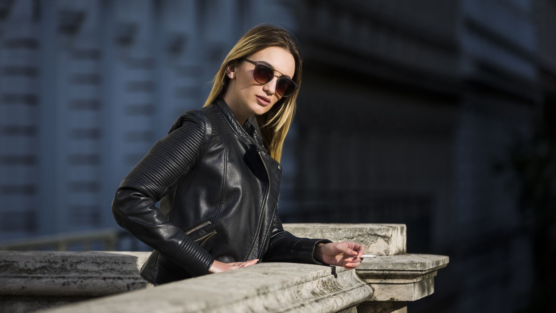 Daring girl in a black leather jacket and glasses Desktop wallpaper 1920x1080