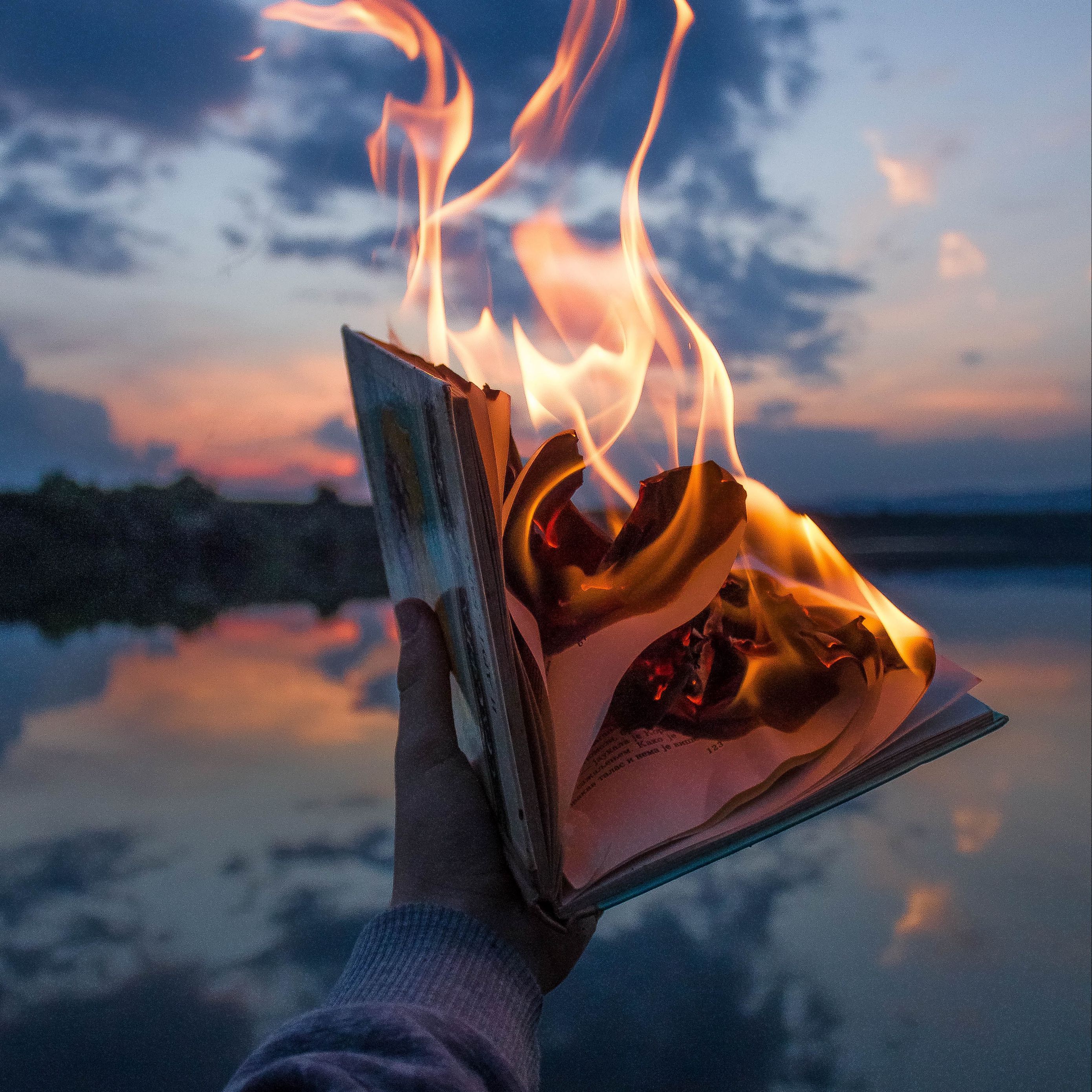Download wallpaper 2780x2780 book, fire, hand, flame, dusk ipad air, ipad air ipad ipad ipad mini ipad mini ipad mini ipad pro 9.7 for parallax HD background