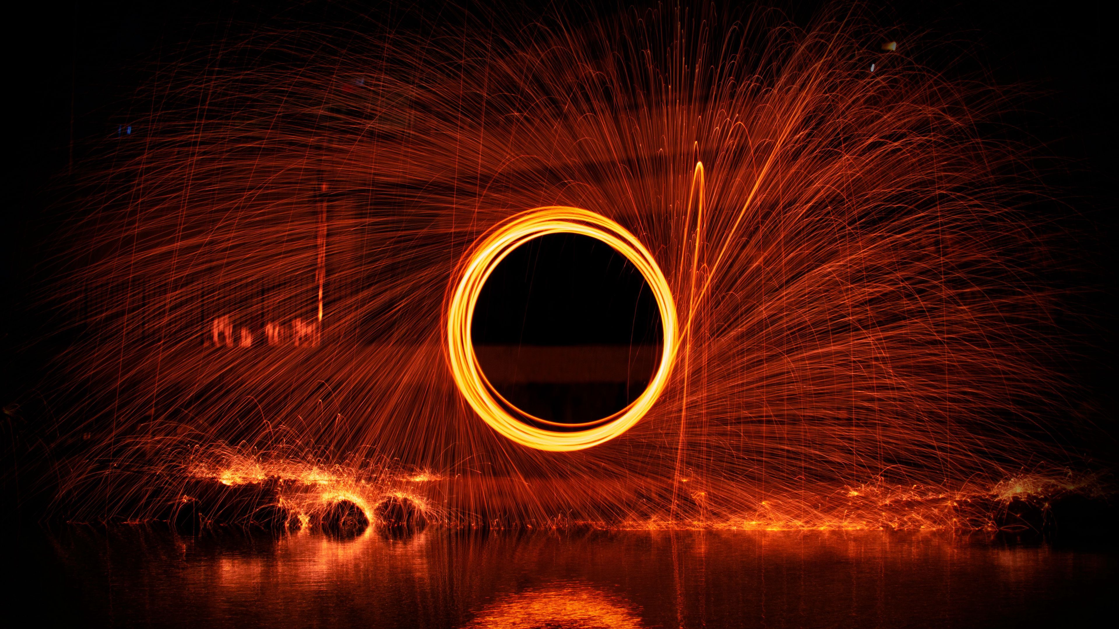 Download wallpaper 3840x2160 circle, movement, sparks, glow 4k uhd 16:9 HD background